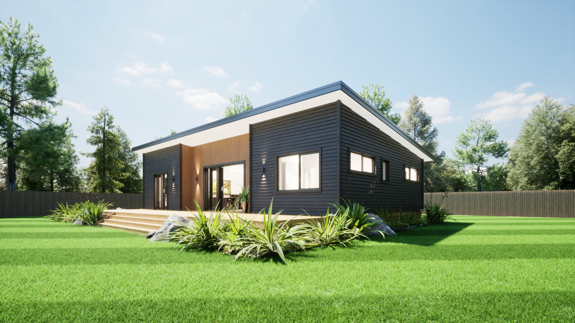 Modern black house with wooden accents, large windows, a deck with steps, surrounded by green grass and plants, with a wooden fence and trees in the background under a clear blue sky.