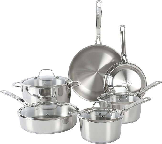 Set of five stainless steel cookware pots and pans with glass lids, various sizes, with one hanging from the others.