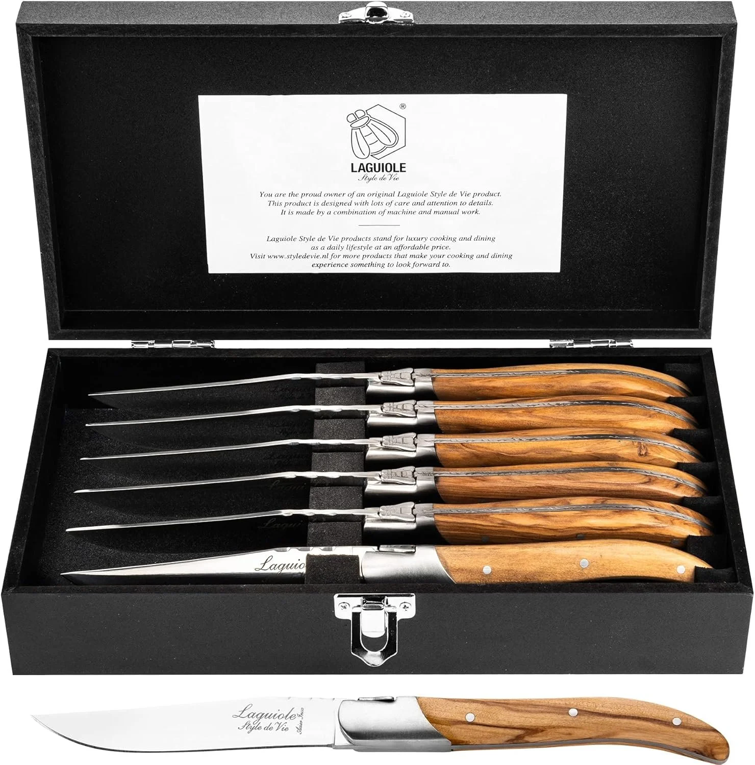 Set of six Laguiole steak knives with wood handles and stainless steel blades in a black case.