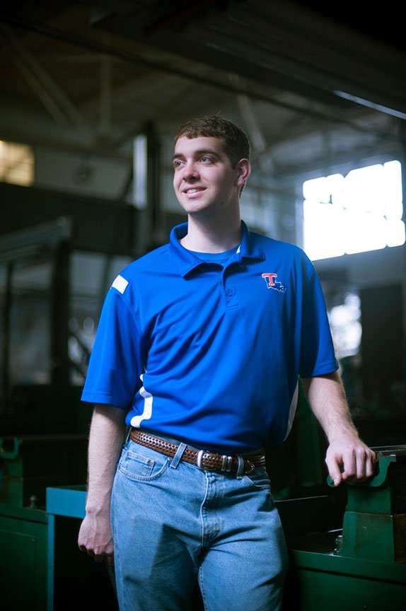 Louisiana Tech engineering student Nathan Seal stands for a portrait in the EcoCar workshop.