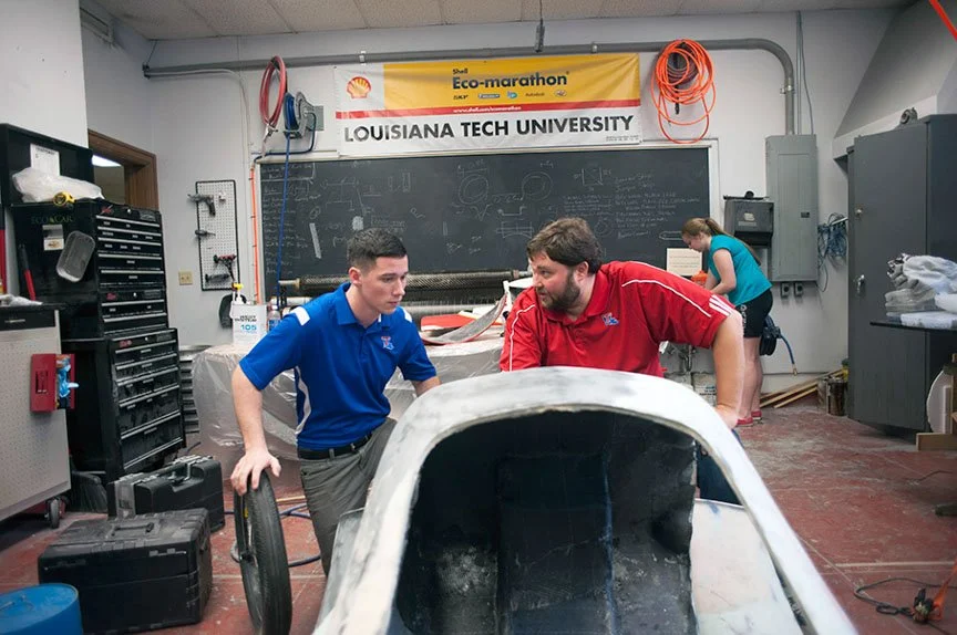 Louisiana Tech students assemble the lightweight body of an EcoCar competition vehicle.