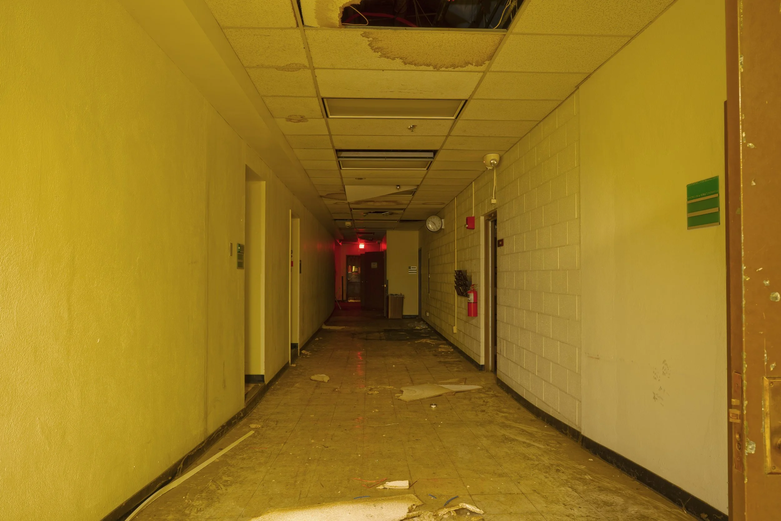 A side hallway on the 1st floor leads to storage rooms and a large main generator room