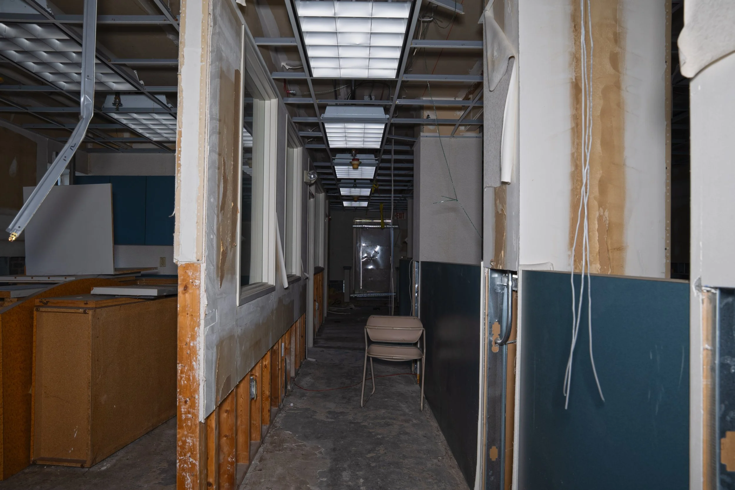 Office space near Jefferson entrance the corridor straight ahead and to the right leading down into the gymnasium  