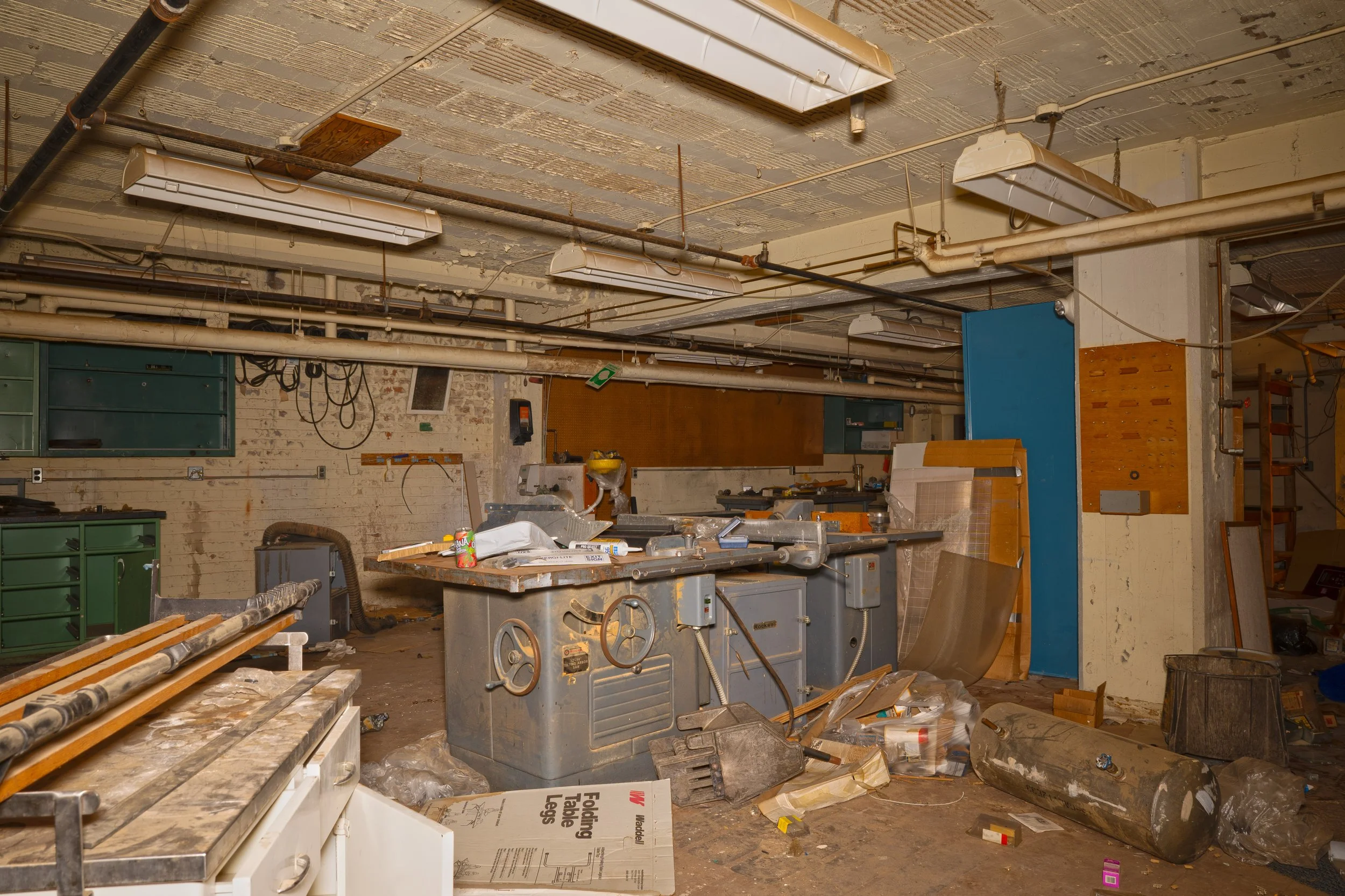 A workshop area in the basement mechanical corridor 