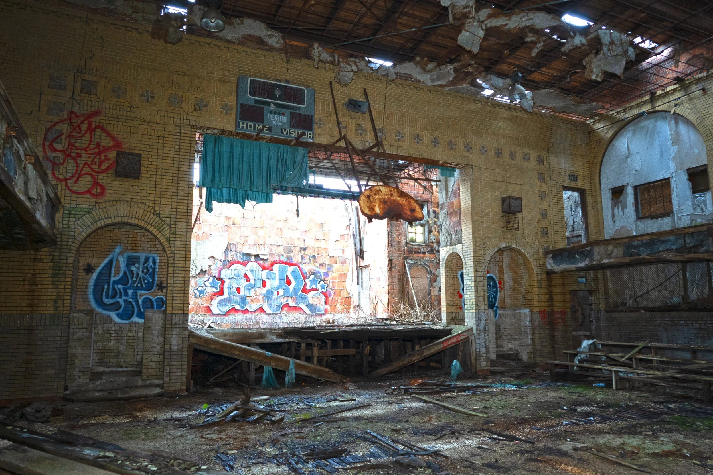 Gymnasium shot 7 (Note the pillar columns that remain on the facade of the stage, common in a church sanctuary but not in a gym) 