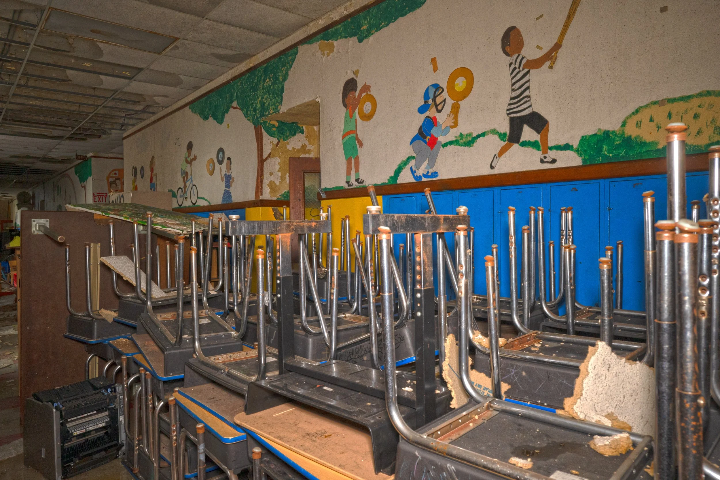 Desks lined up in the 1st floor hallway