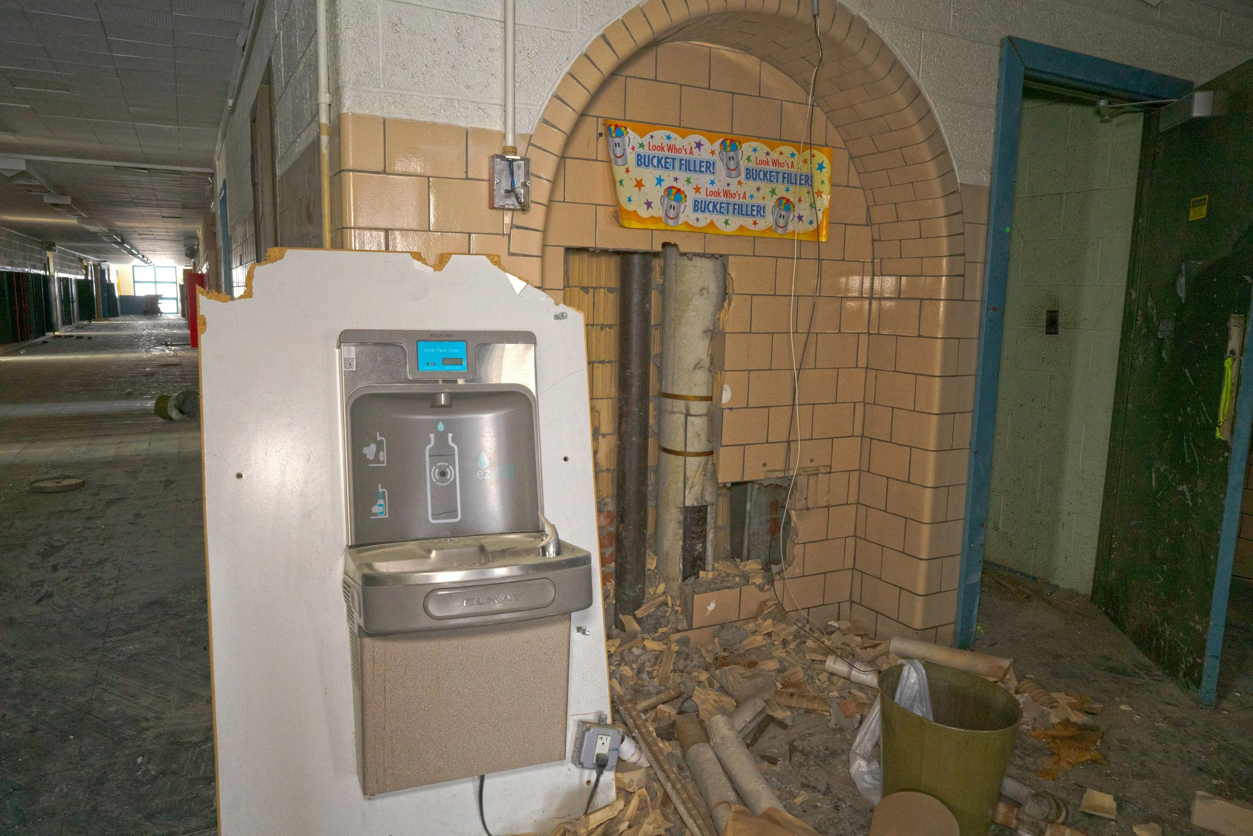 A drinking fountain remains intact on the 2nd floor