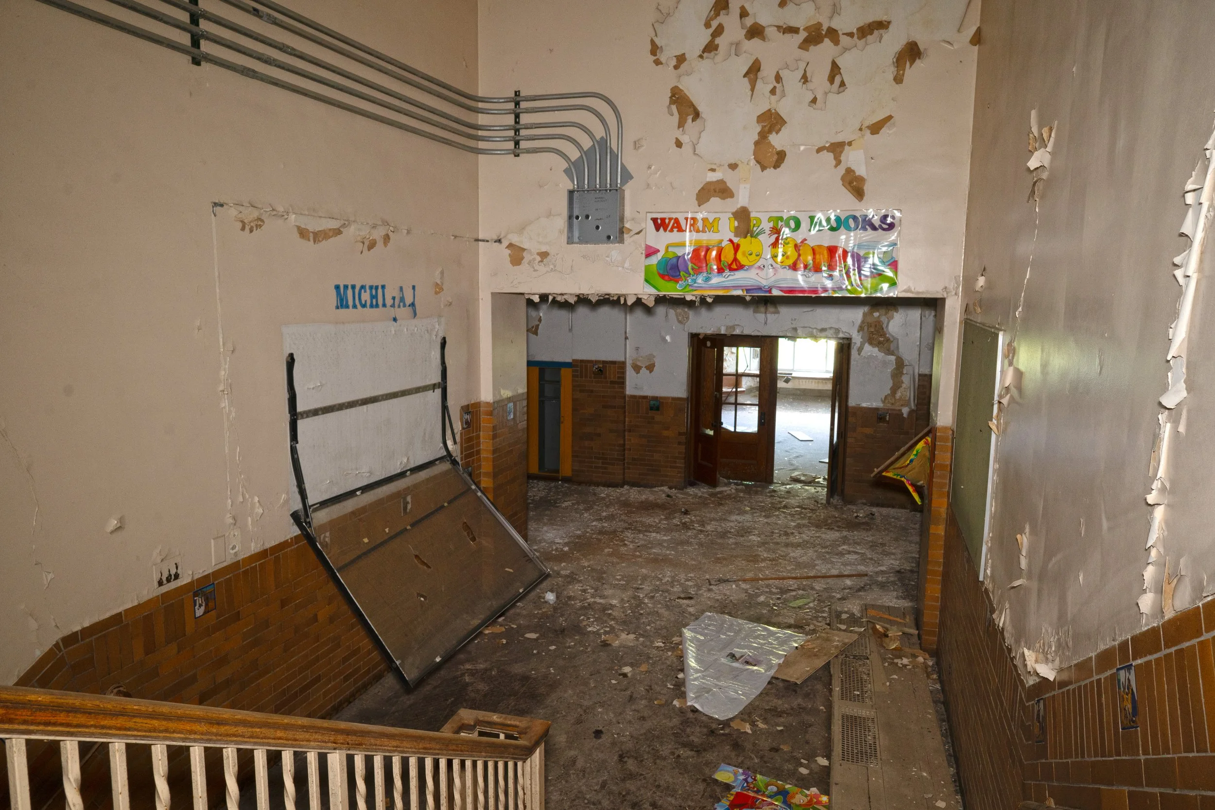 Staircase leading down from the last 2 classrooms shown as mentioned likely specialty classrooms