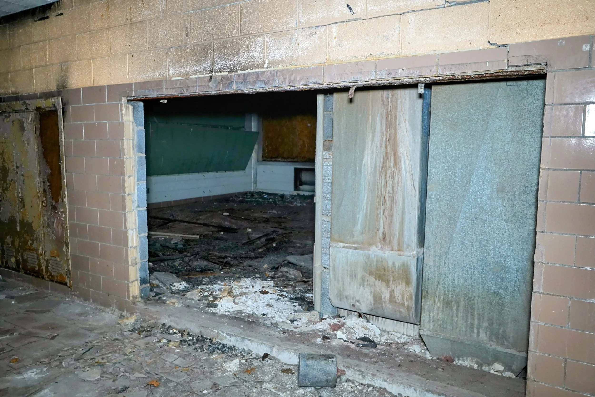 Some Lockers have been scrapped out and the wall separating the lockers from the classroom is removed  