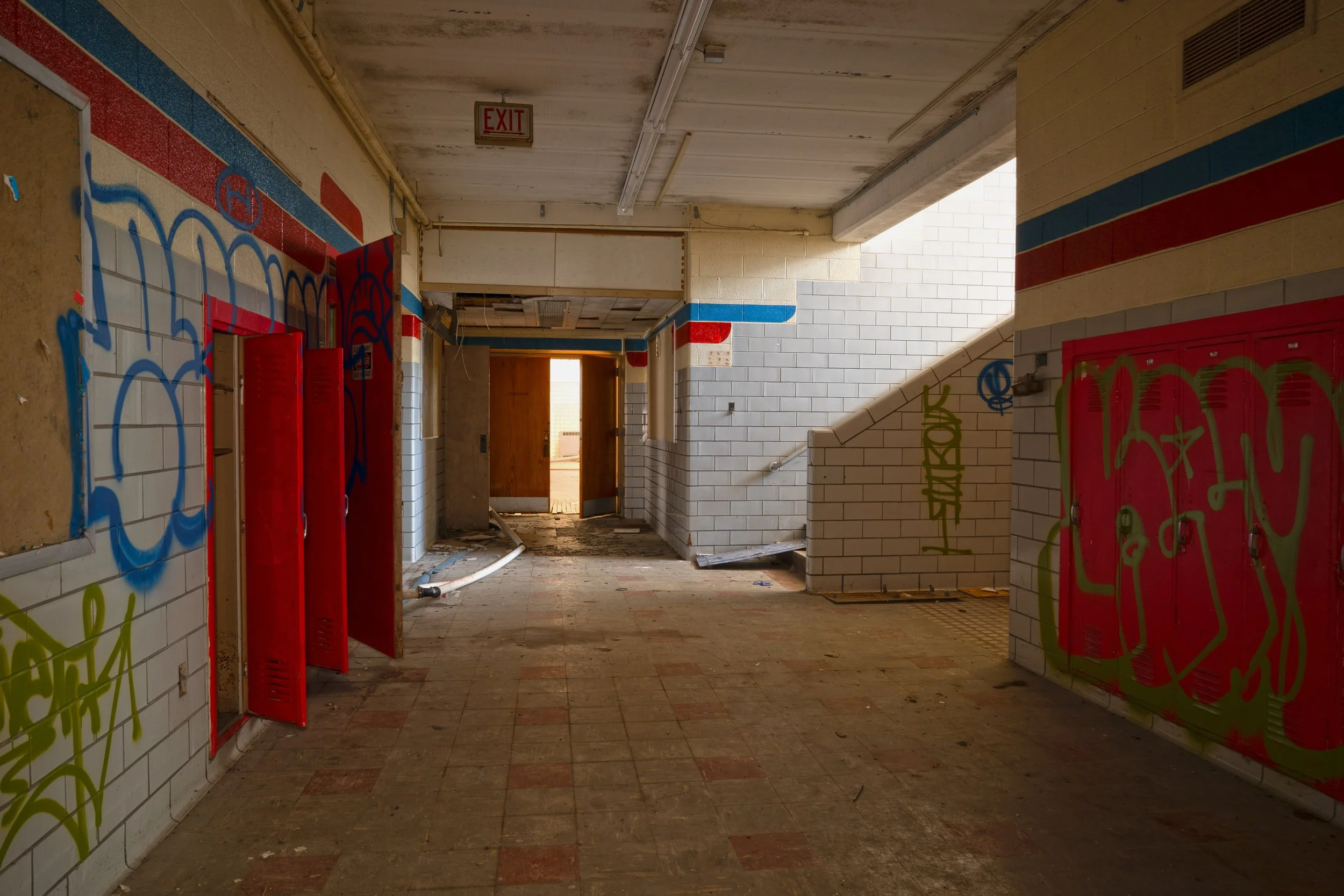 1st floor hallway next to gymnasium 