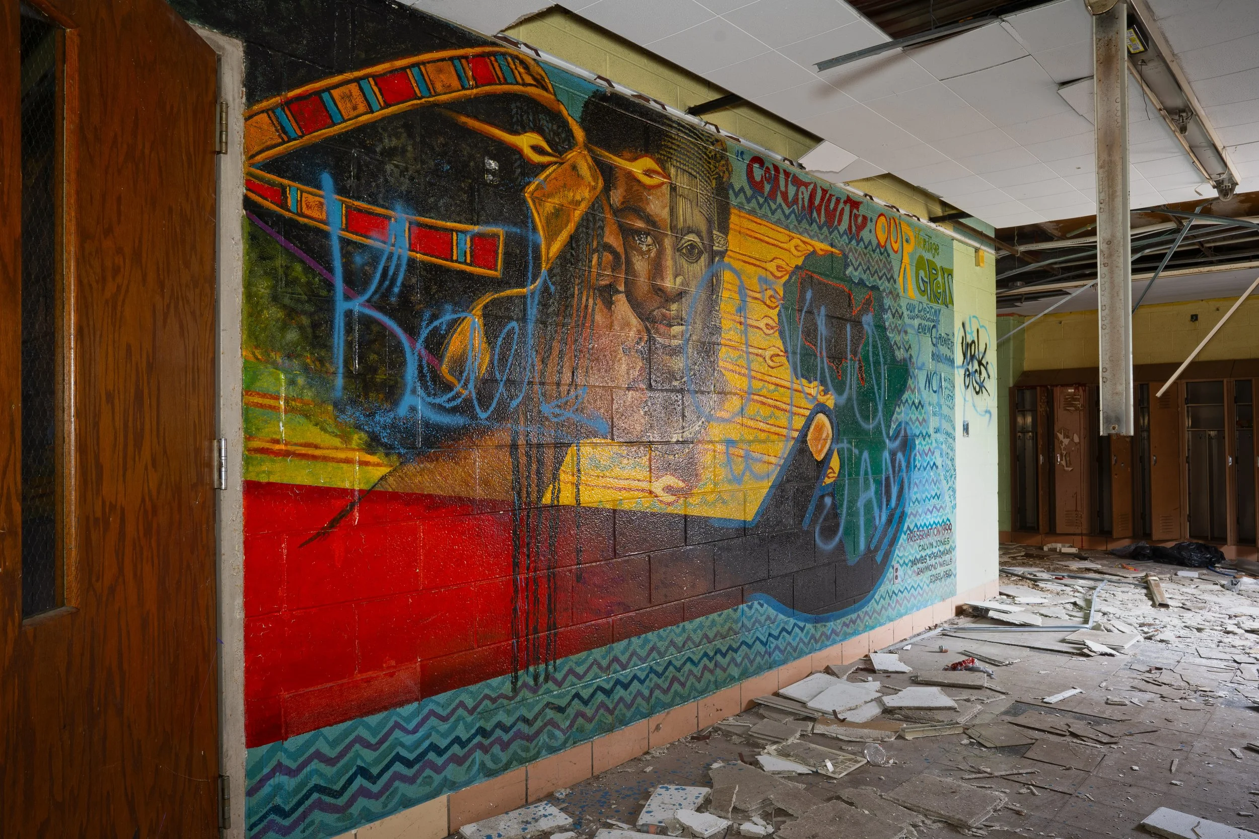 unfortunately since our last visit to the school this previously perfectly intact mural has been tagged over 