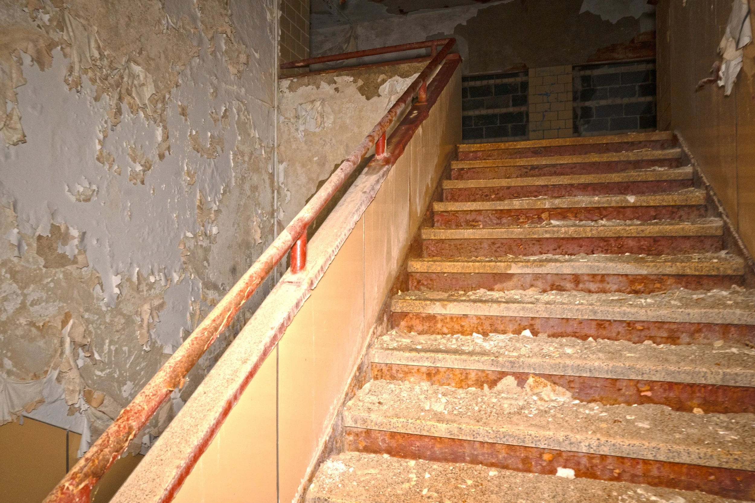 Stairs leading to 2nd floor located next to the gymnasium 