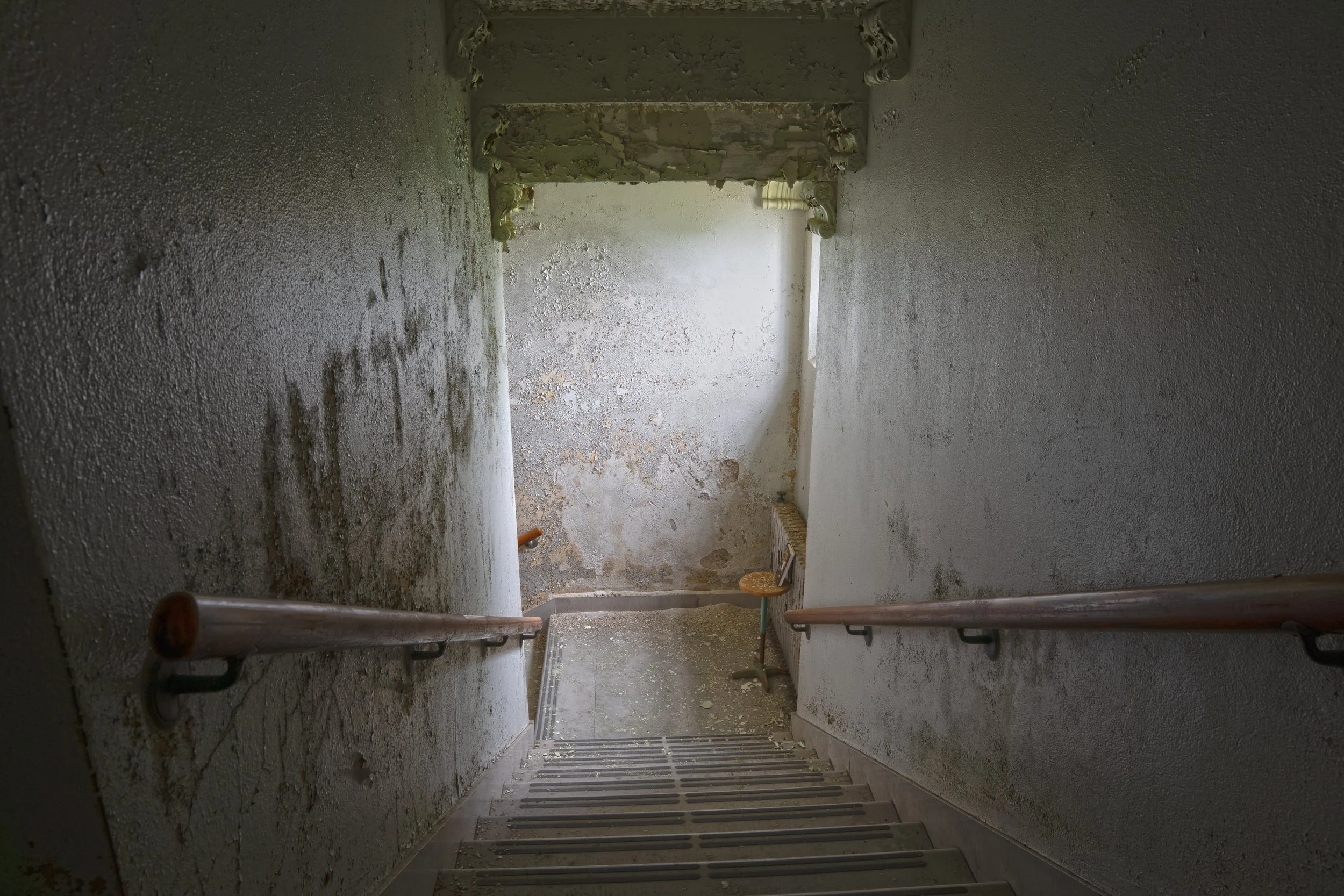 Staircase as seen from 2nd floor looking down at 1st floor