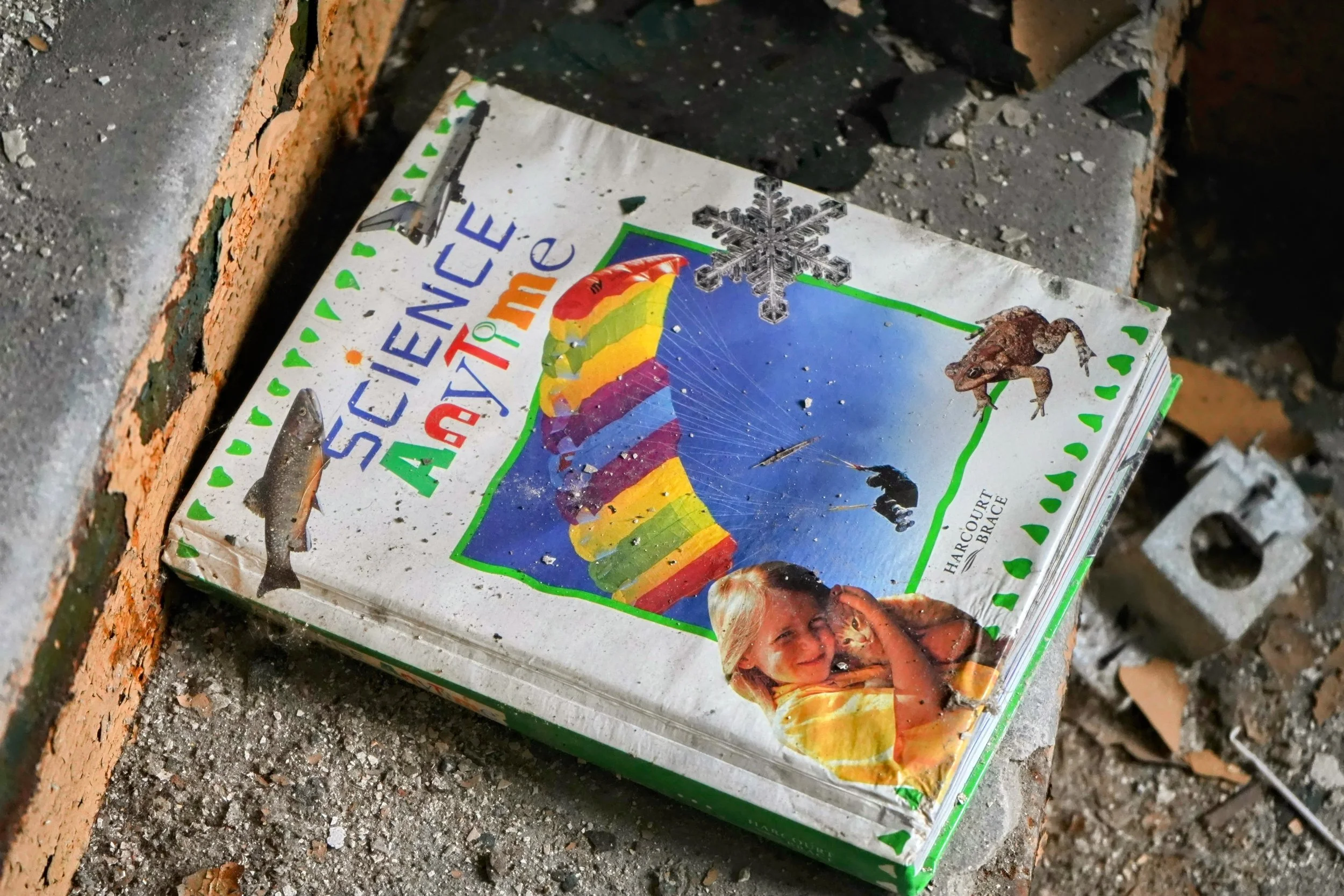 Textbook left behind titled "Science Anytime"