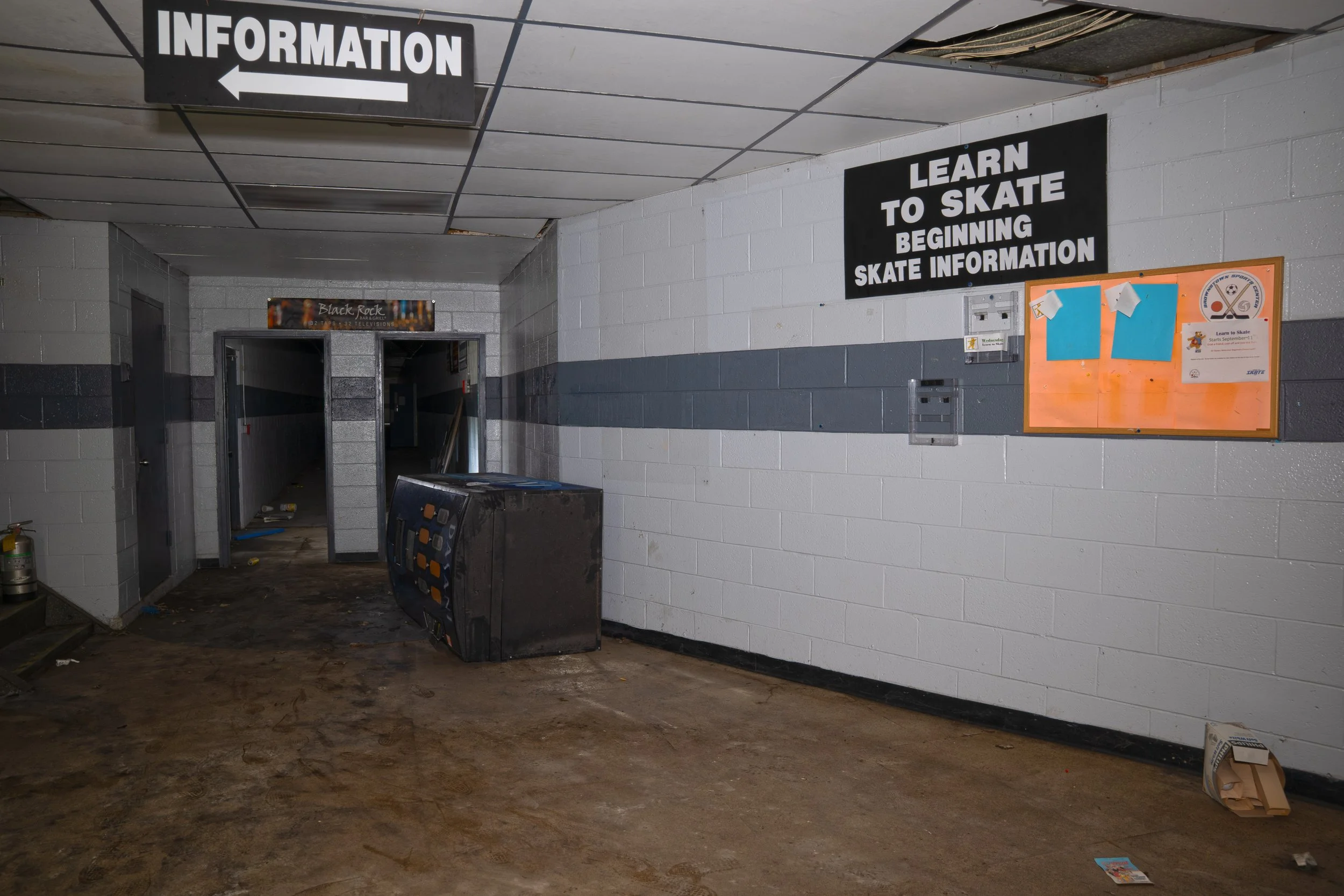 Hallway next to ice rink to the right