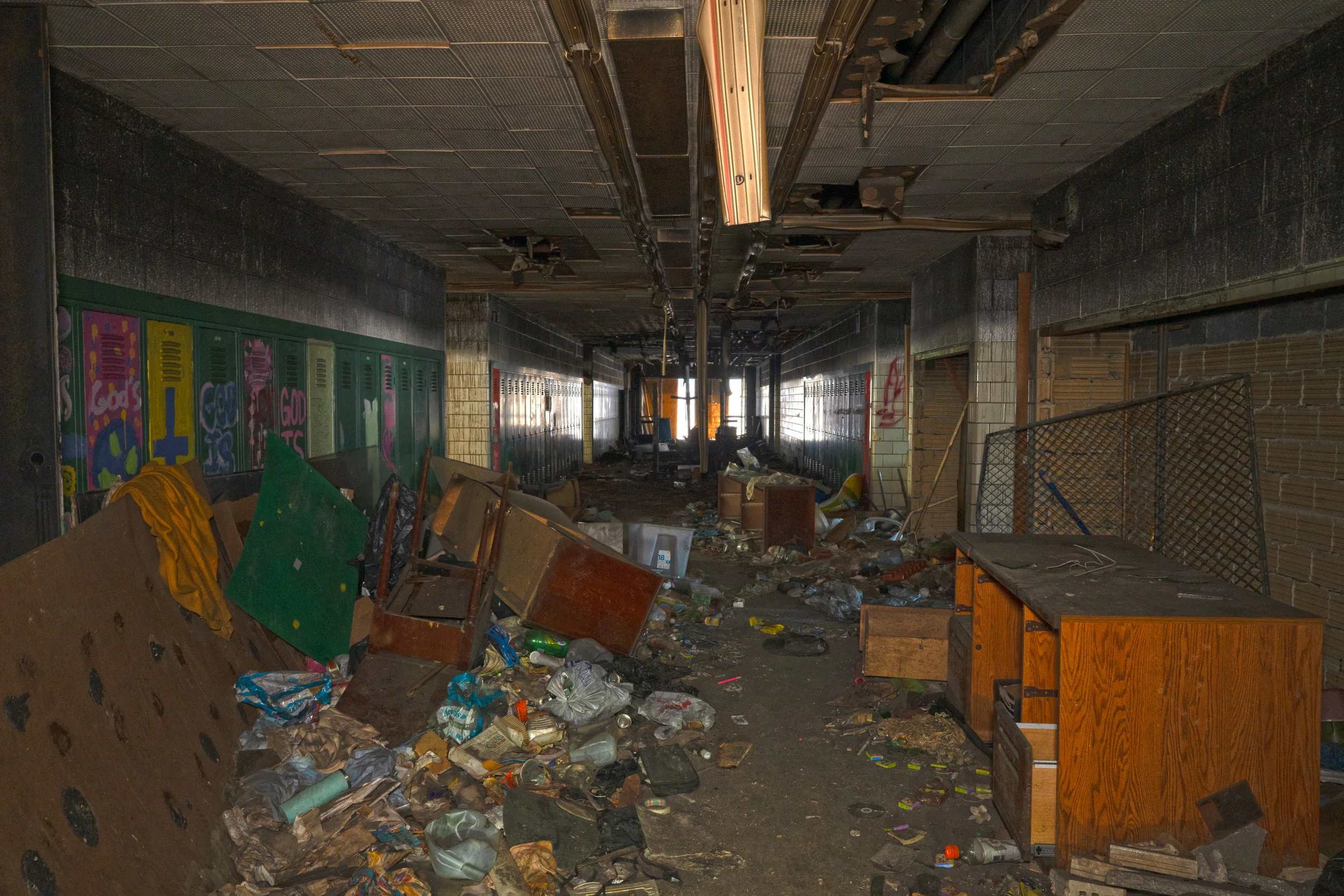 Classroom corrdior (Note the squatter belongings along the ground) 