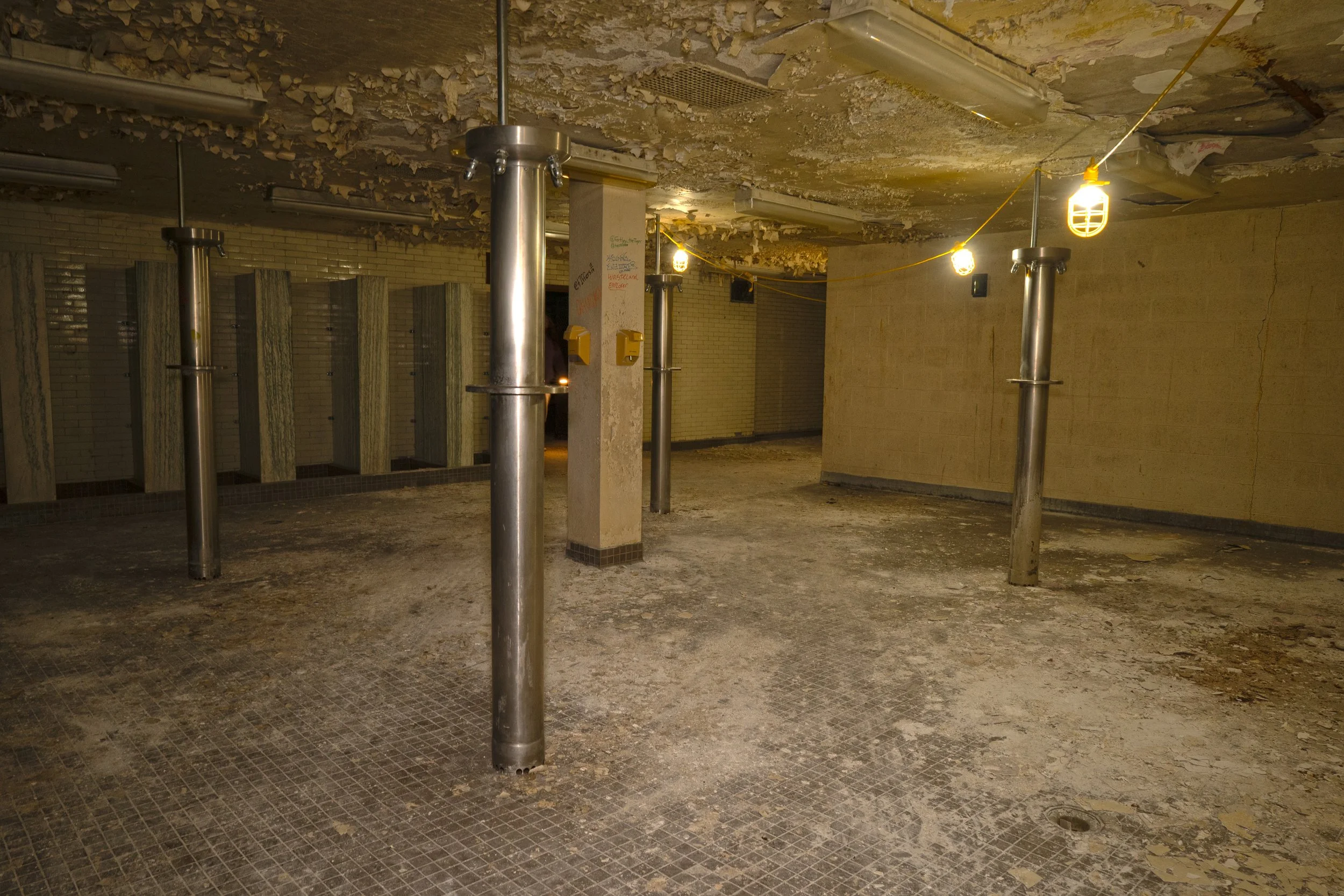 Shower room accessible from both pool sections 