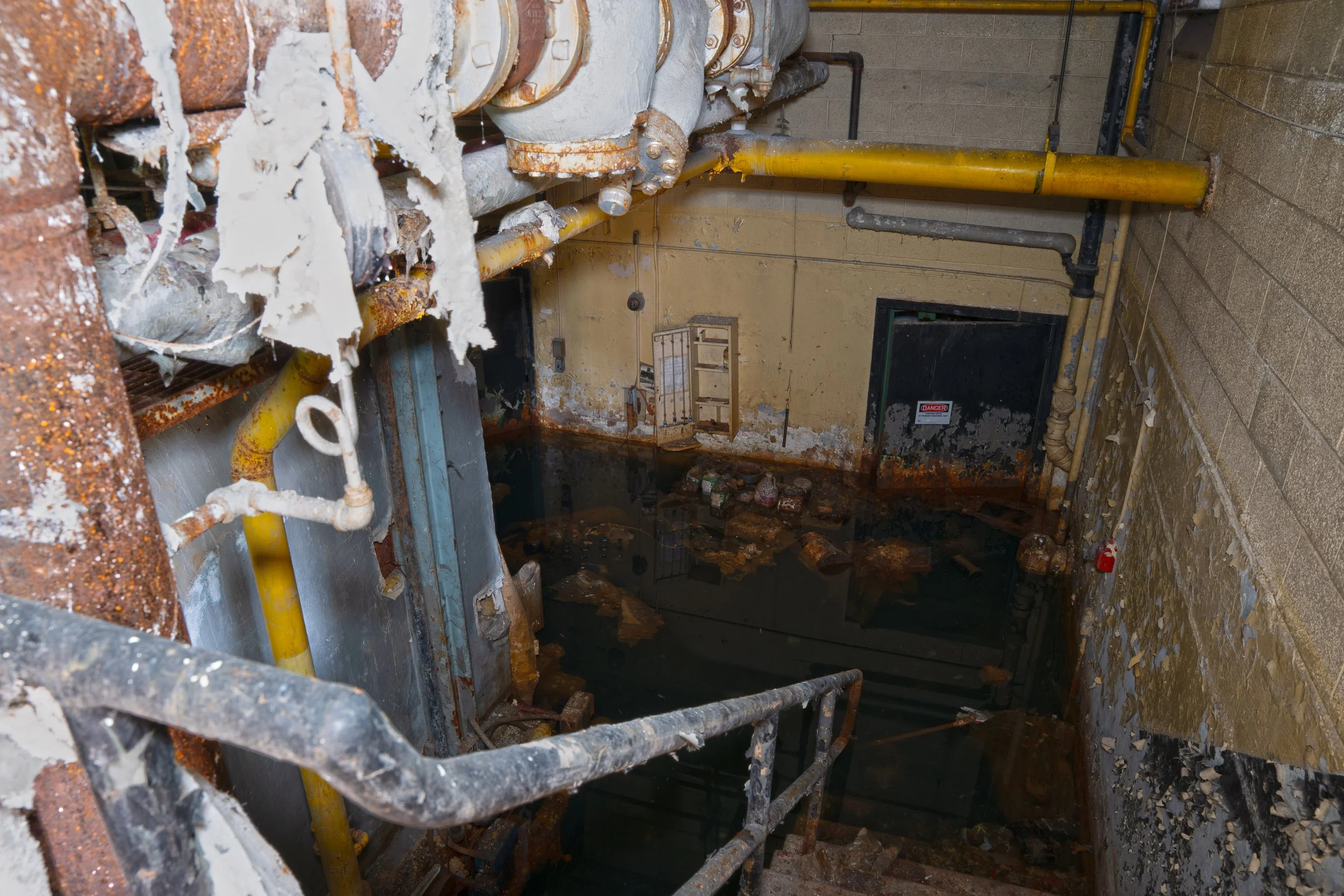 Flooded basement next to gym