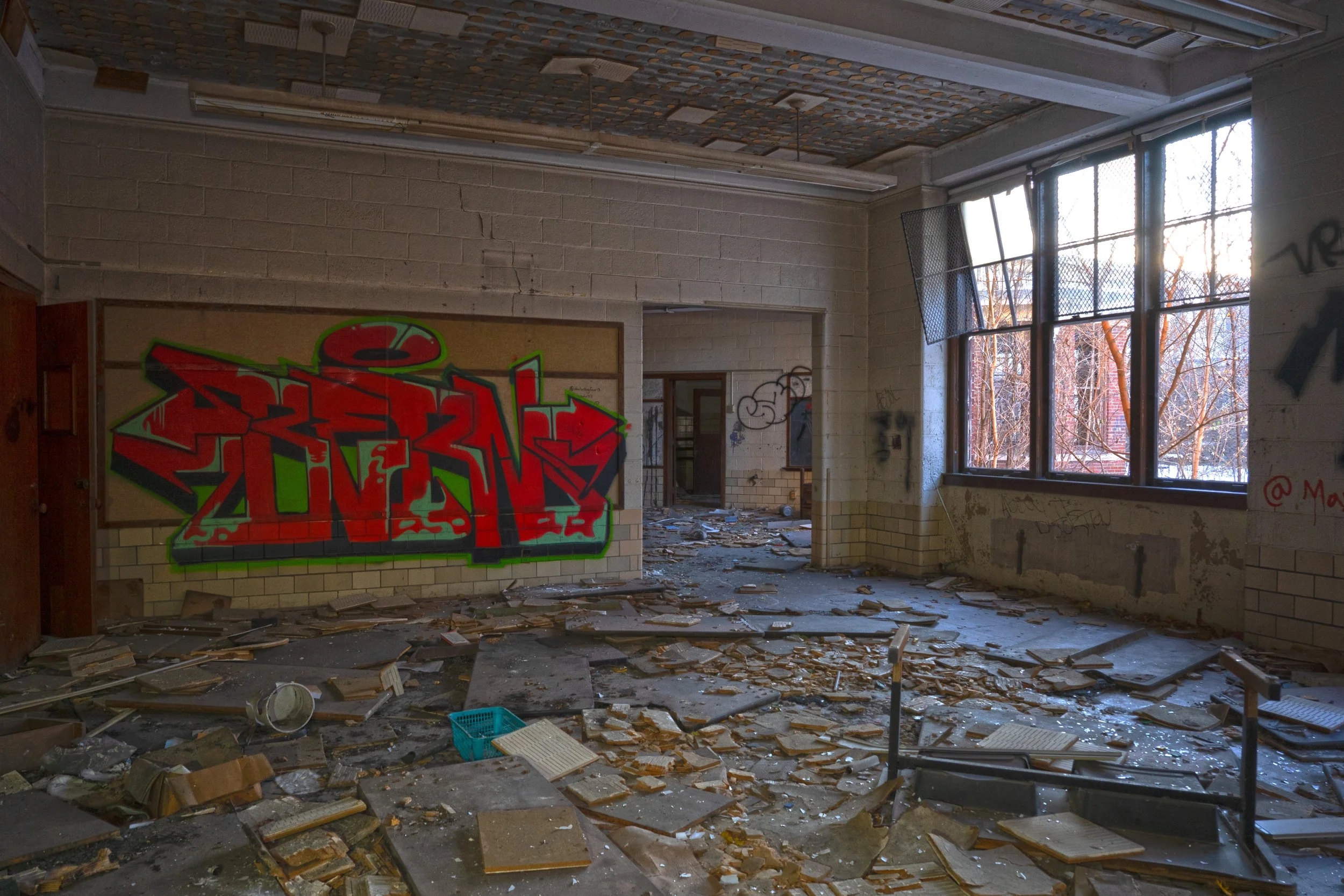 Nearby the middle of the school a section of 3 classrooms makes up one large space