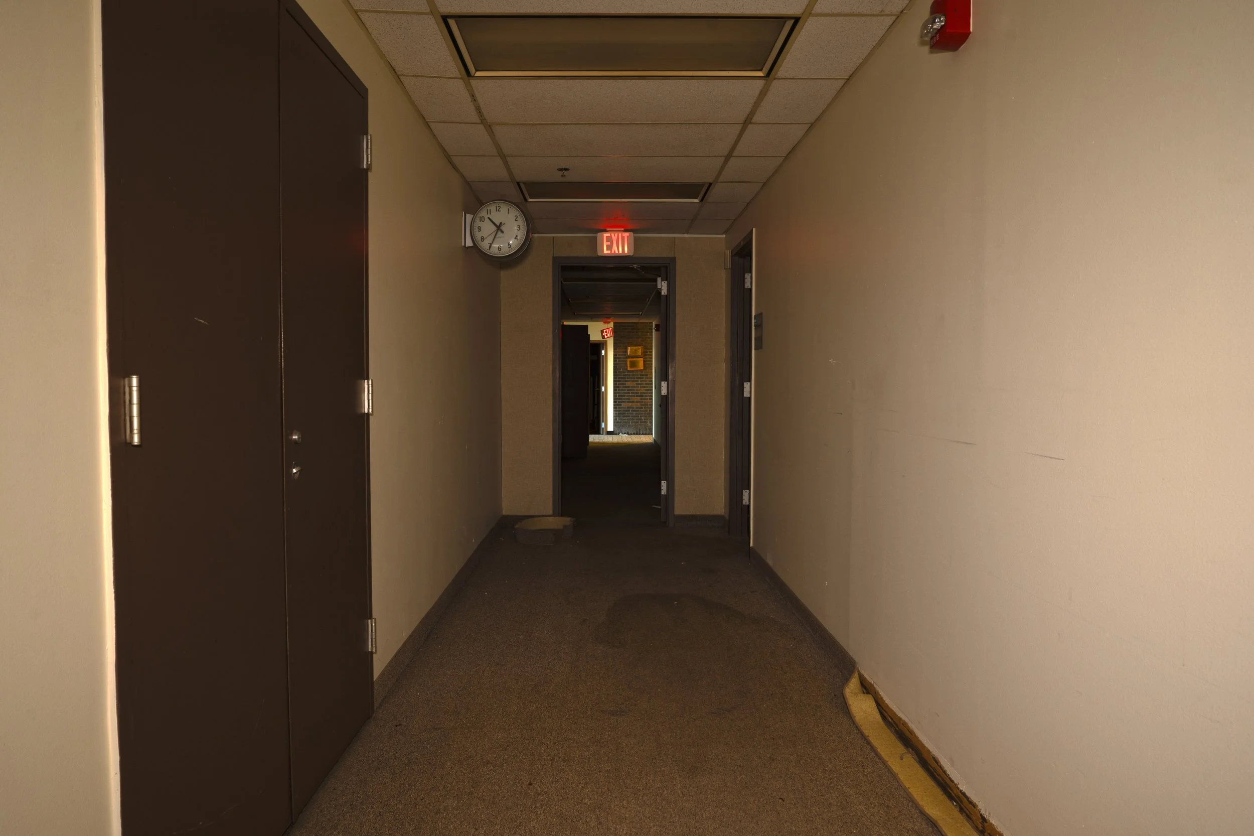 Hallway leading from offices to main hallway on 1st floor