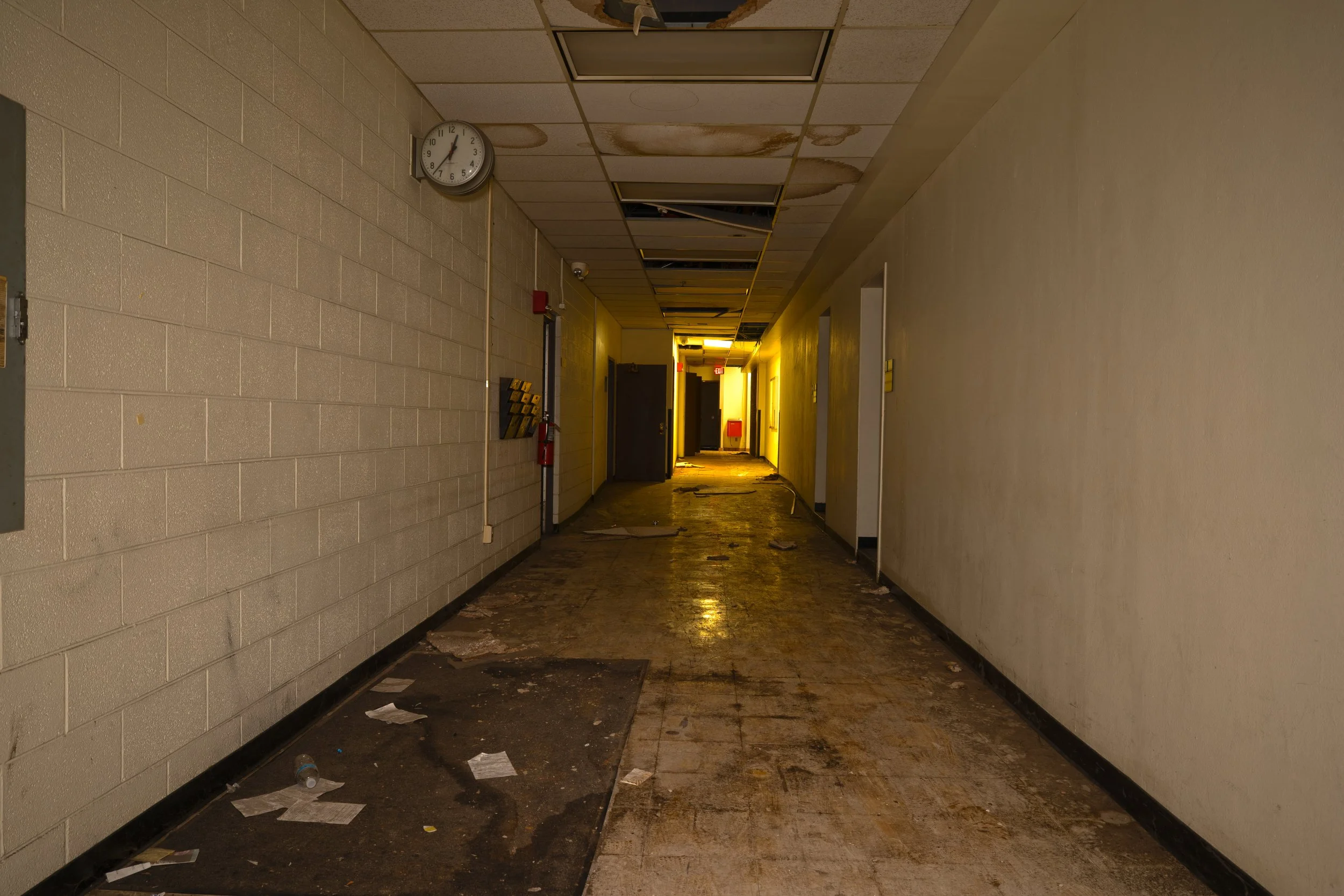 full shot of side hallway in the far background is the main hallway on the 1st floor
