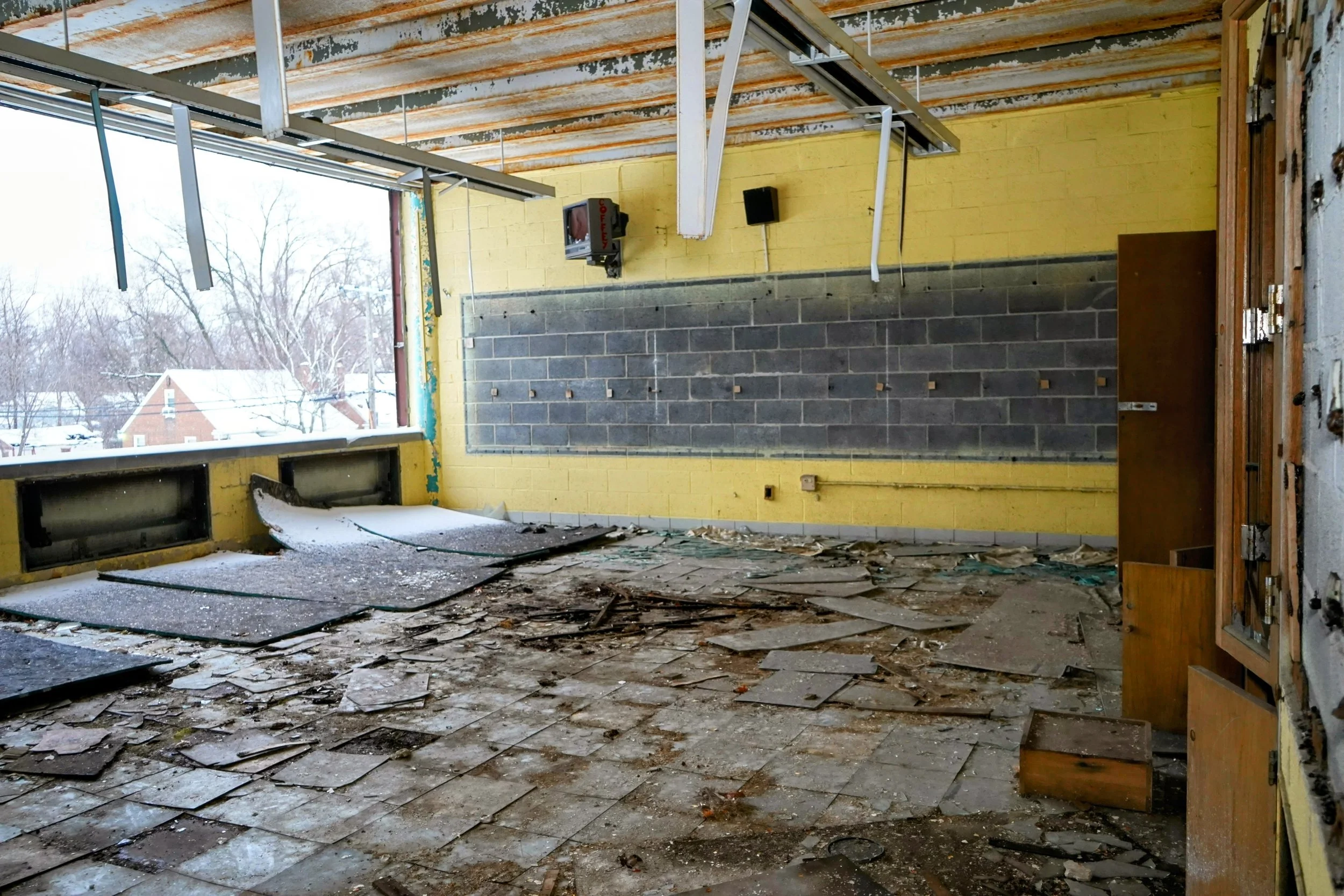 One classroom in the corner of the building hosts a tv still on the wall