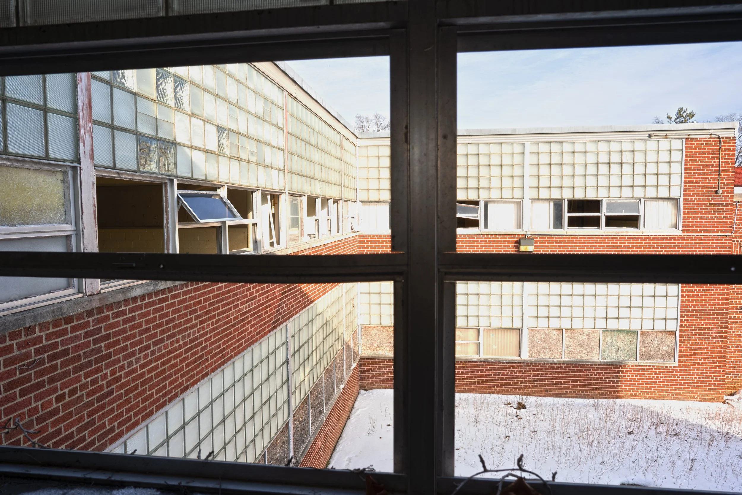 Looking out a 2nd floor classroom window at the courtyard section