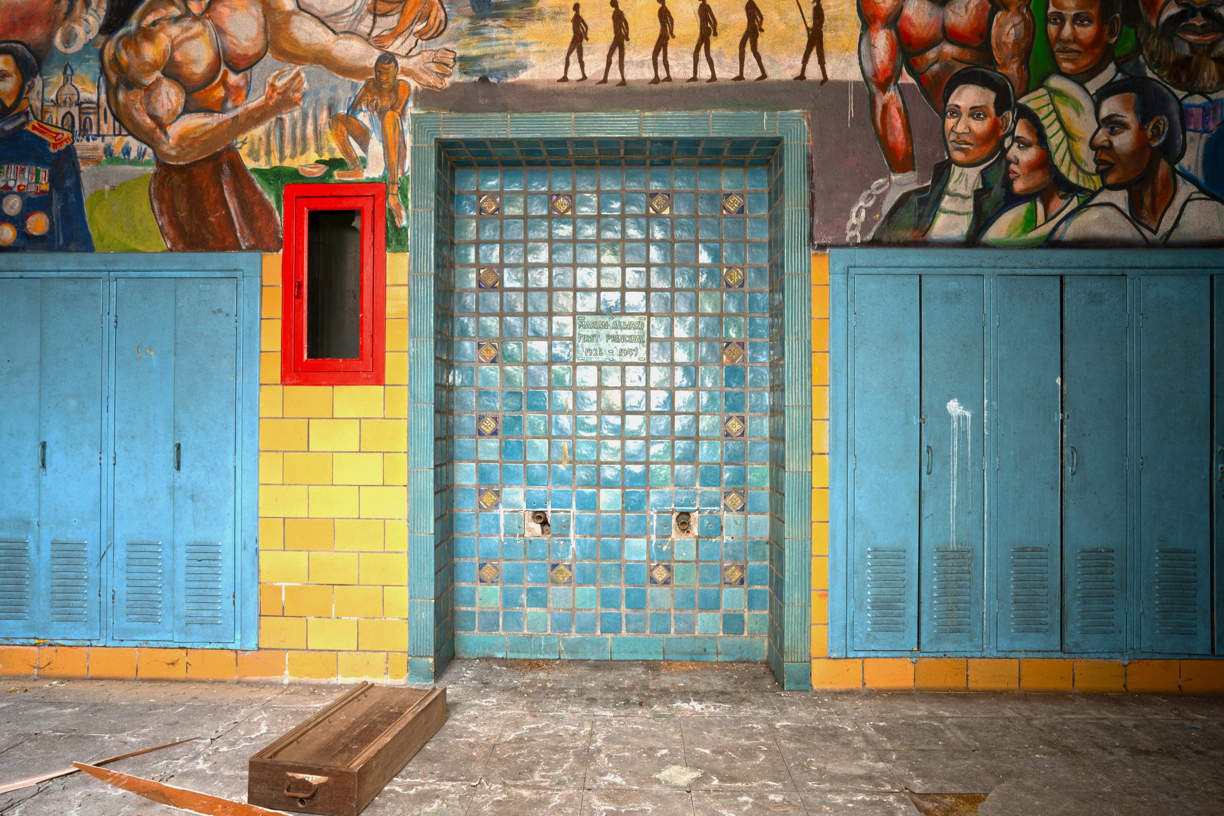 The design has a plaque that commemorates the first principal of Vetal