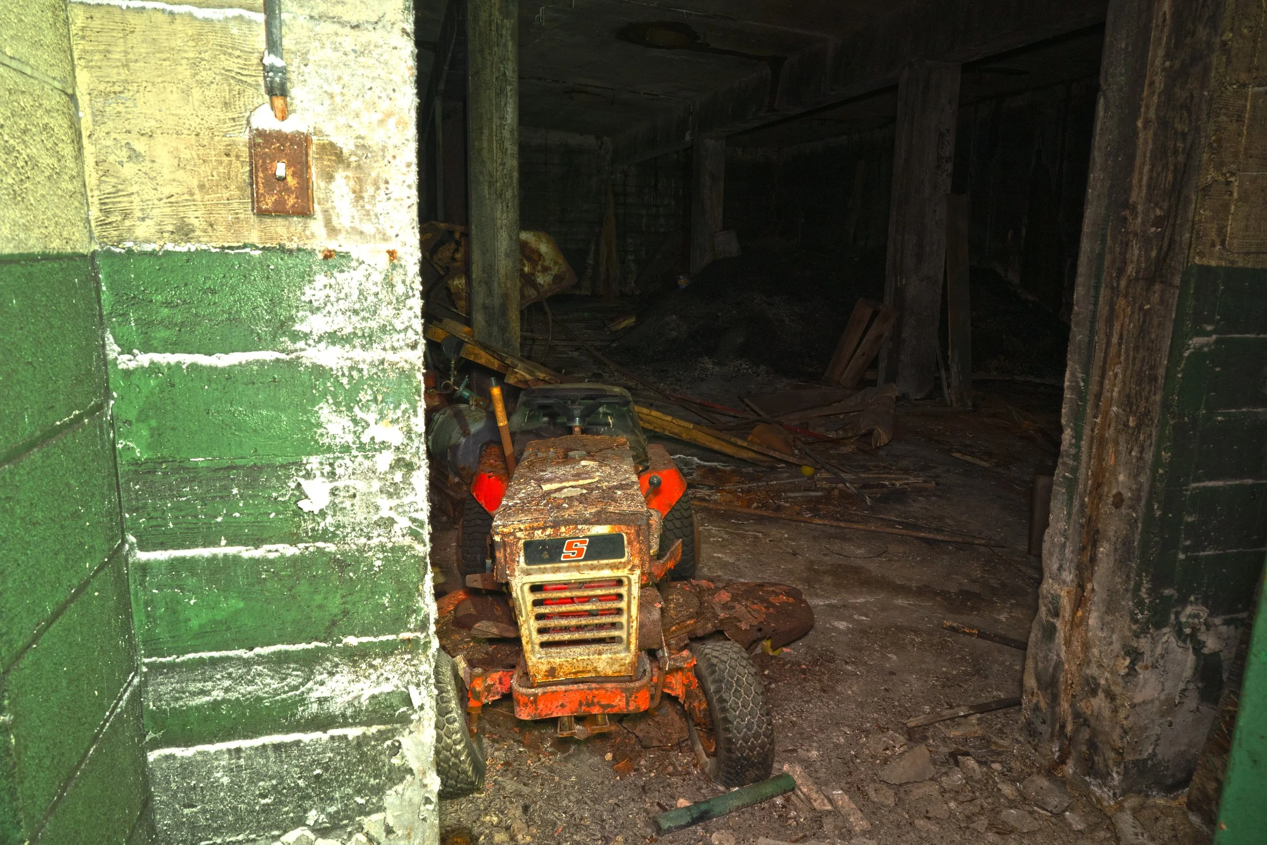 A tractor at the entrance to the storage room