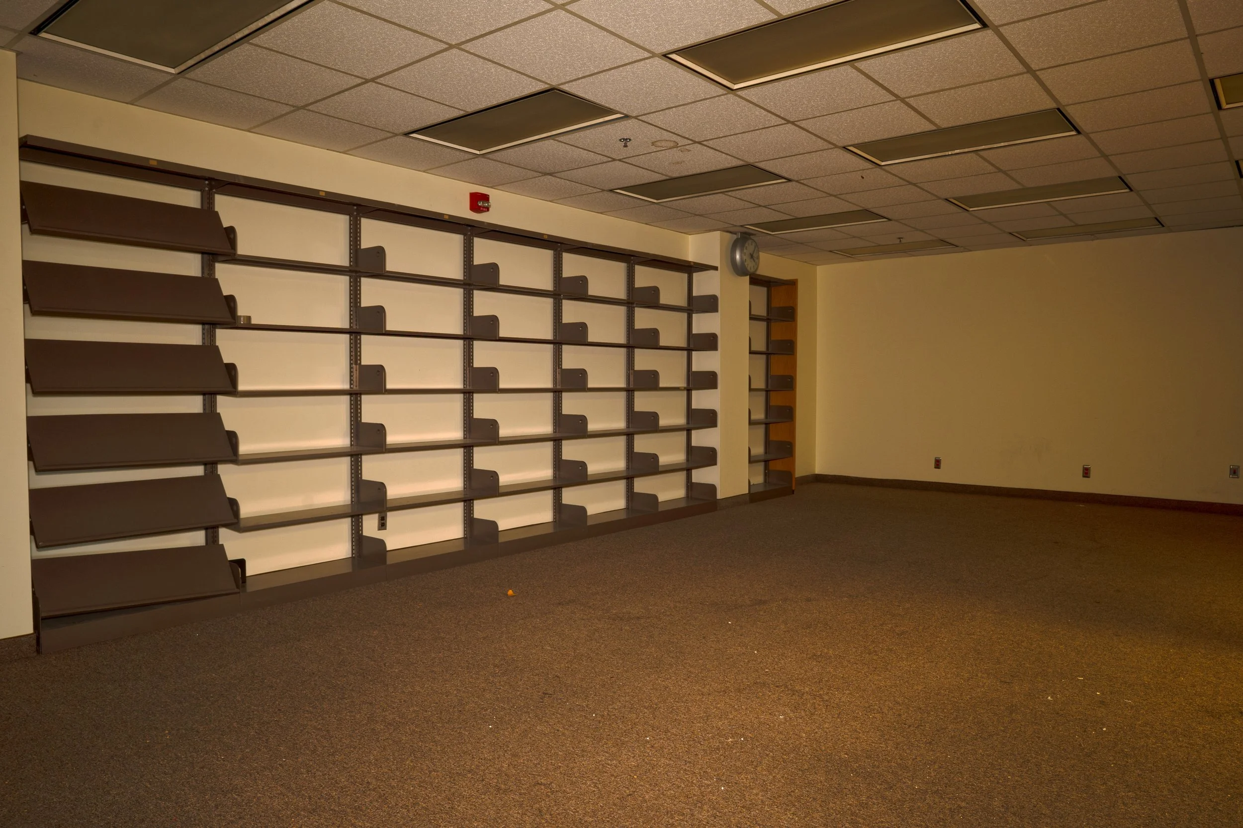 The library has had all of its books removed most likely by the owners 