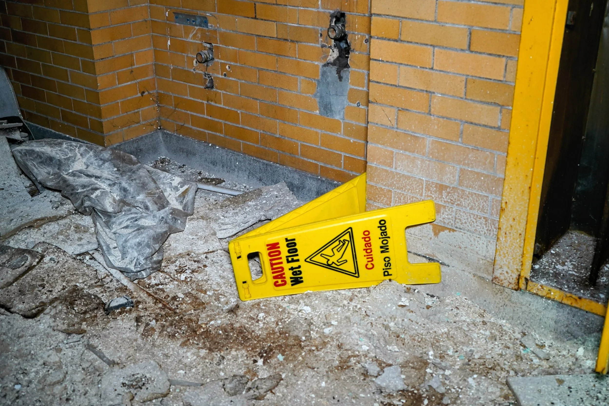 Wet floor sign on the ground