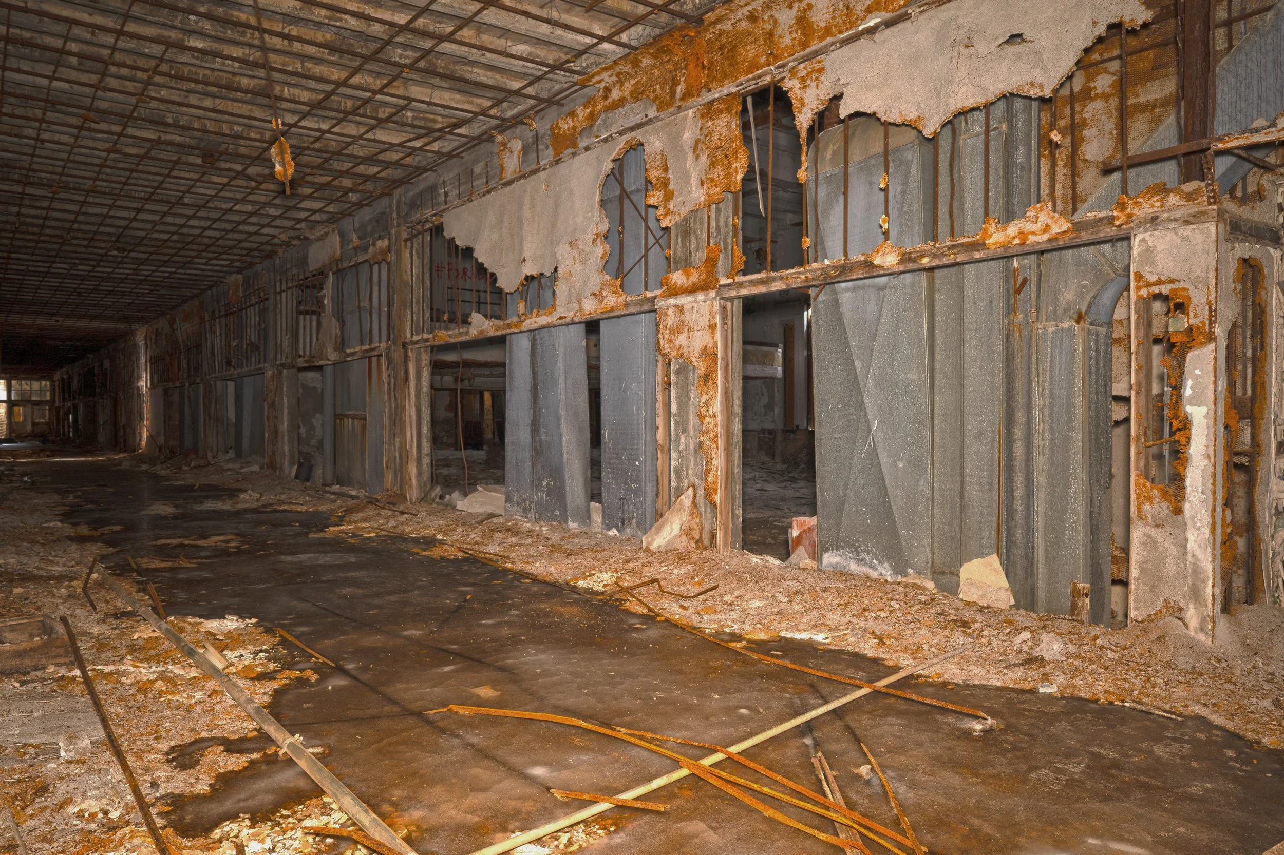 The school as a whole is very horribly scrapped with this section you can see the auditorium space through the holes of once lockers 