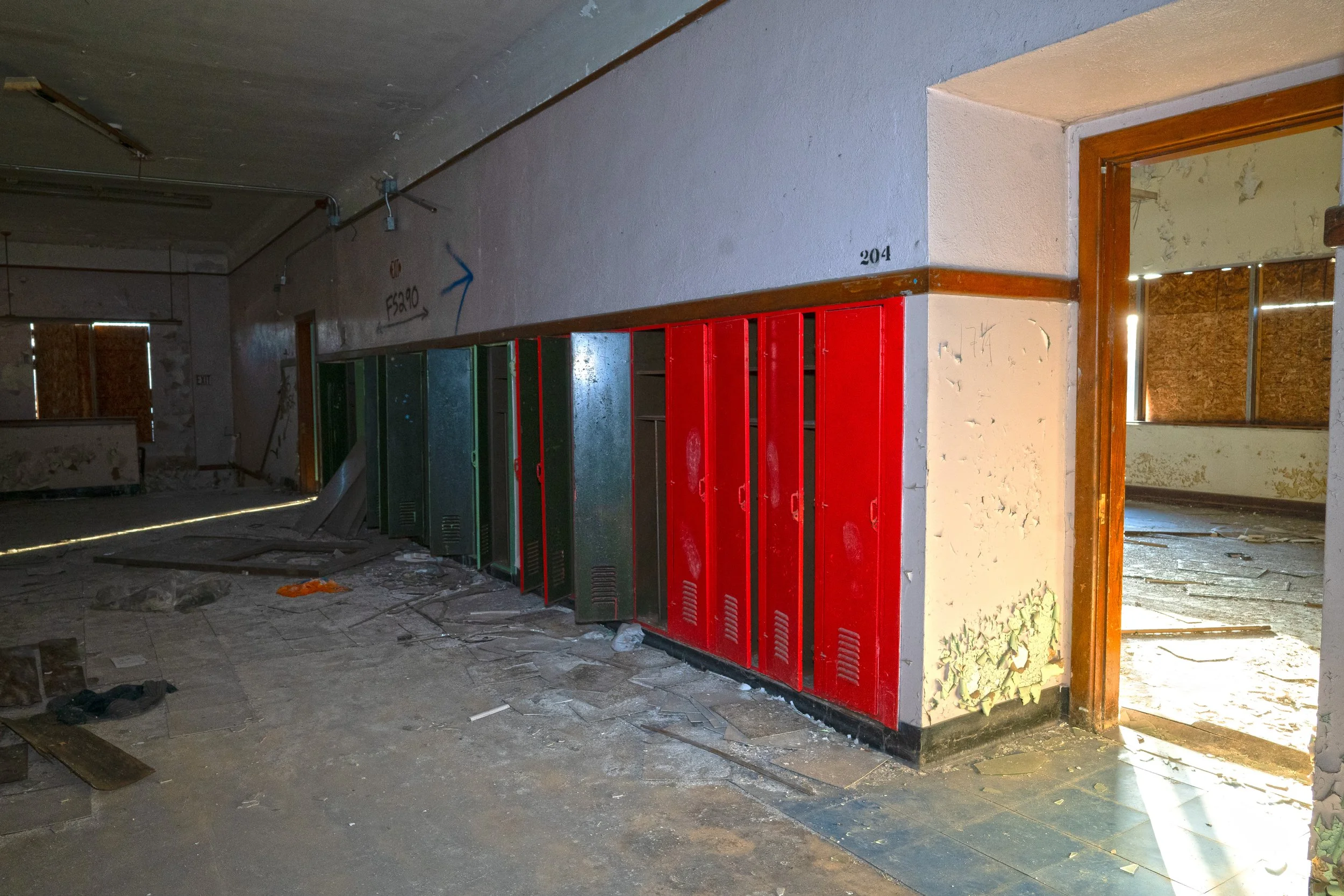 In this small section lockers remain intact with ceilings and walls intact as well