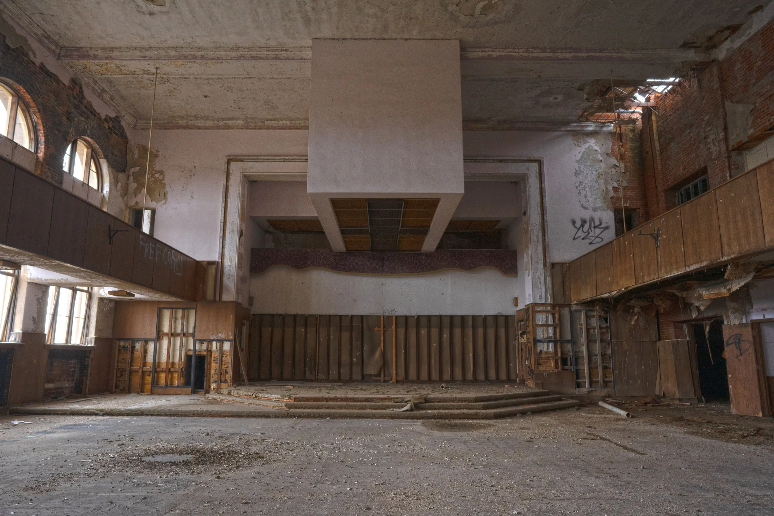A overhead section sticks out that once had lights for the altar section