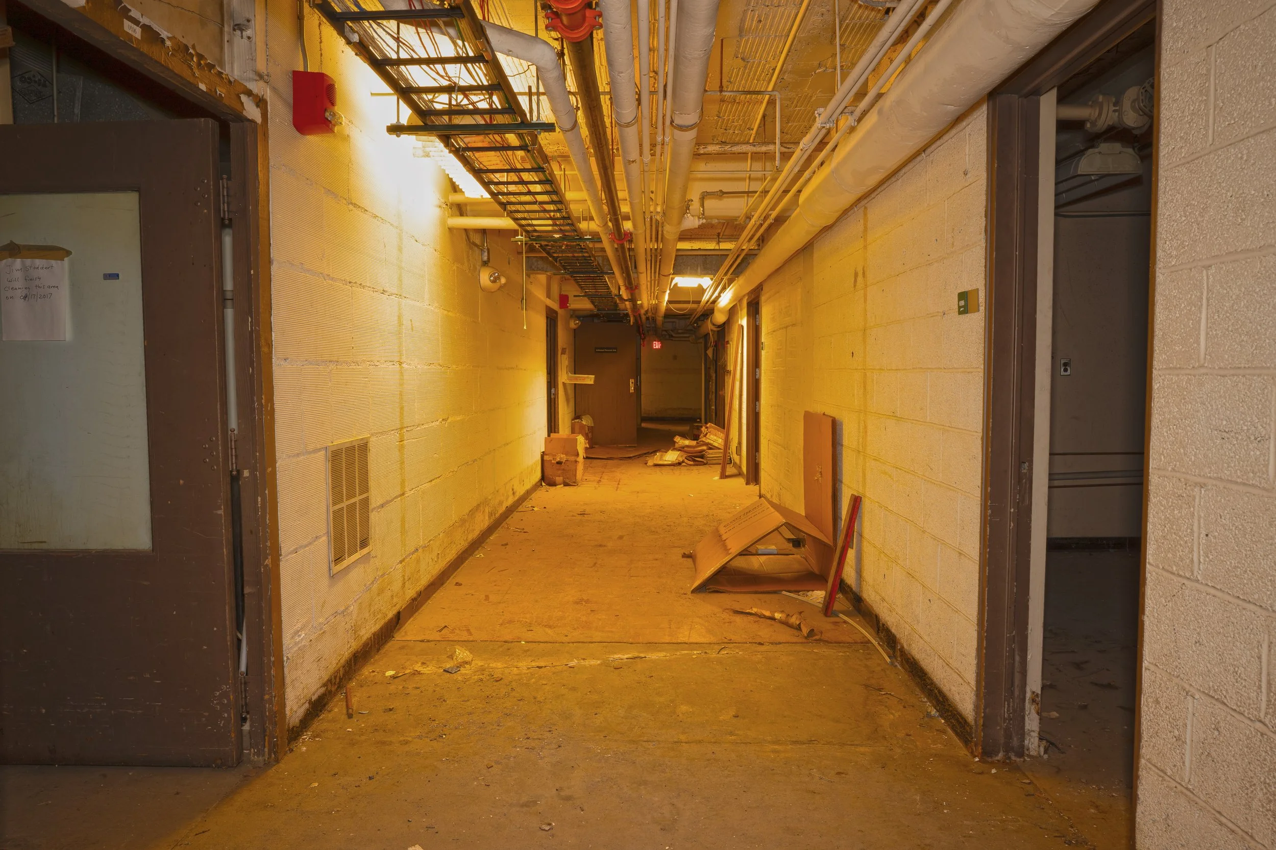a mostly mechanical corridor in the basement  