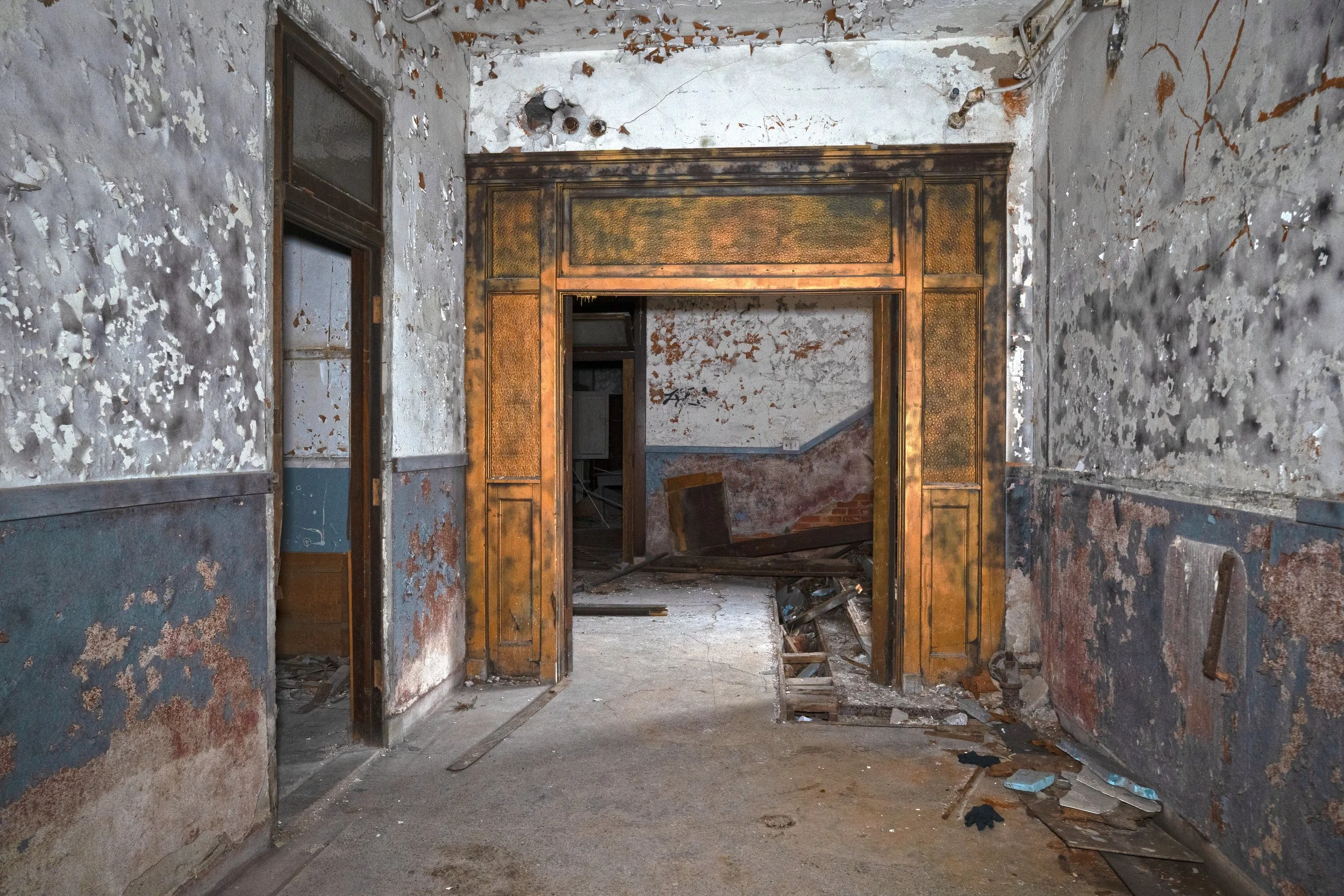 One of the side entrances to the right as seen from a 1st floor hallway 