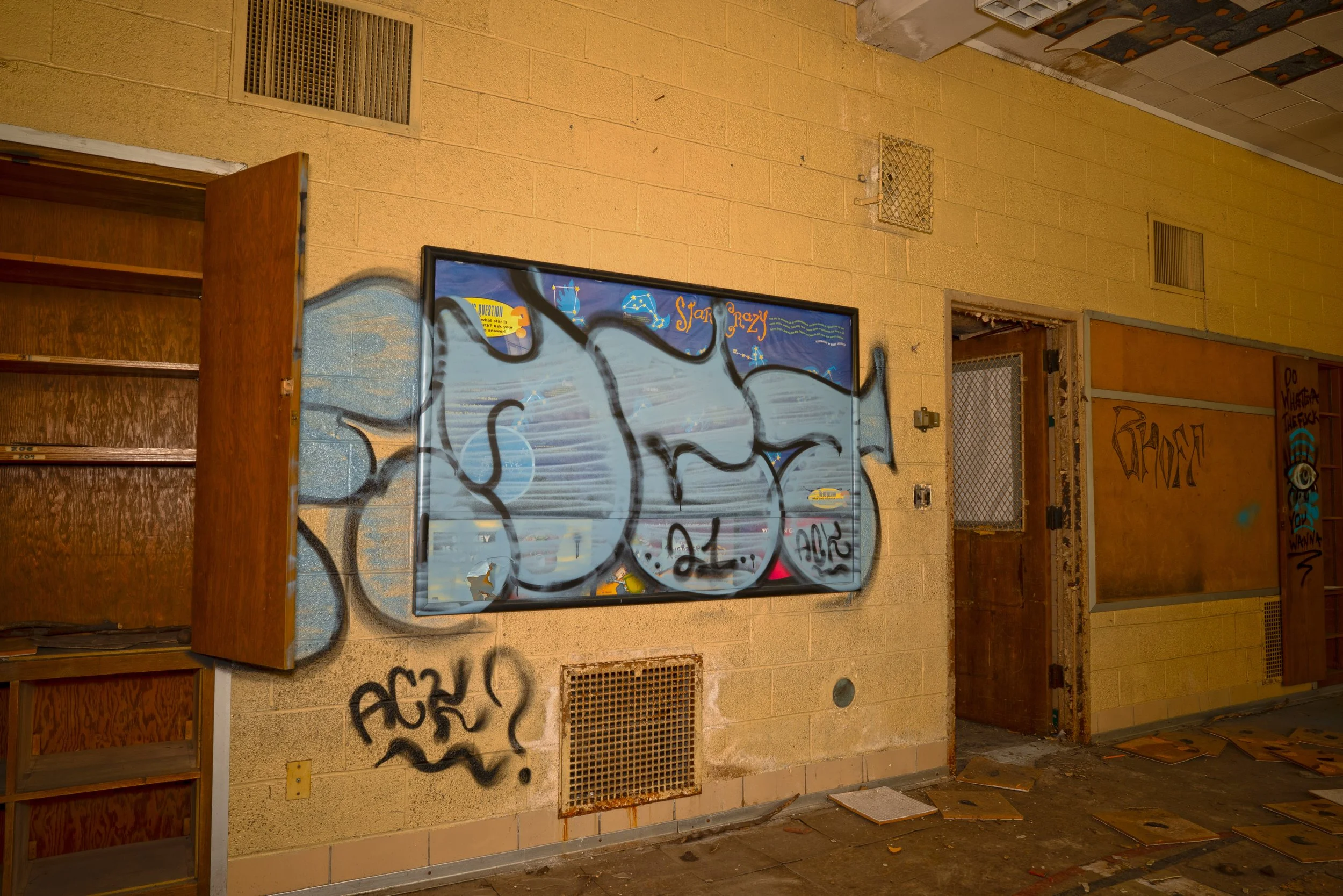 Gymnasium shot 6 (Note the display board in perfect shape aside from a tag painted on top of it in recent years)