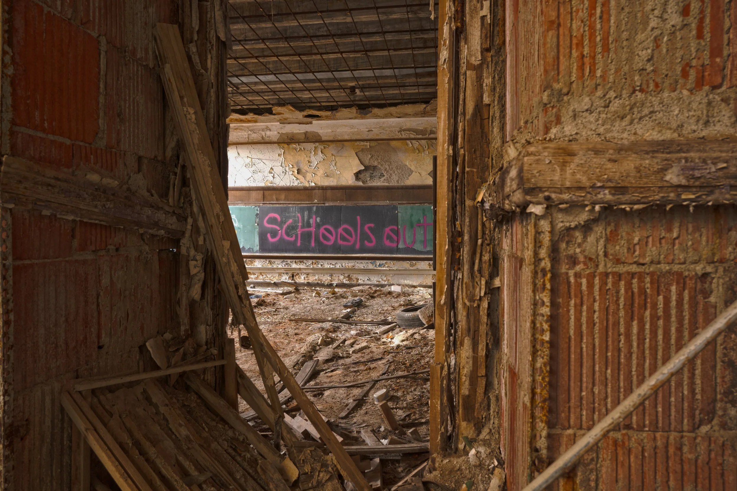 A classroom at the end of the 1st floor hallway, walls have been scrapped