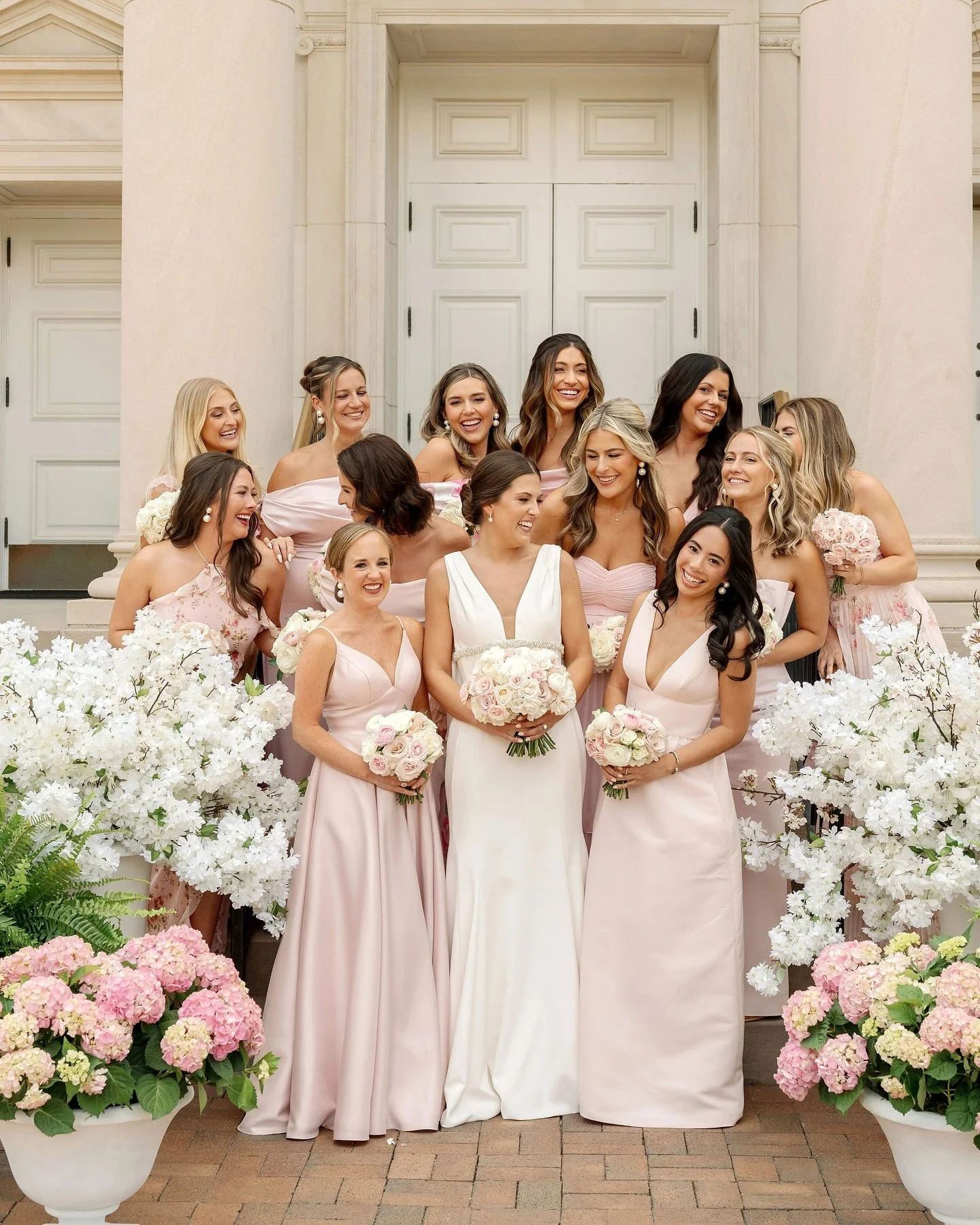 Pretty in pink⁠ 🌸 Madison dreamed of a pink wedding, and that is exactly what she got! Bridesmaid dresses, cherry blossom trees, and her great grandmother&rsquo;s china for the bread &amp; butter dishes were just the start of incorporating this colo