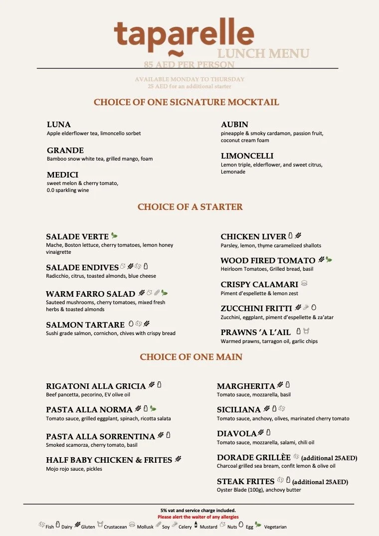 Menu from Taparelle restaurant featuring lunch options from Monday to Thursday, including signature mocktails like Luna, Aubin, Grande, Limonnelli, and Medicci. It offers starters such as Salade Verte, Chicken Liver, Wood Fired Tomato, Crispy Calamari, Zucchini Fritti, and Prawns 'A L'Air'. Main courses include Rigatoni Alla Gricia, Pasta Alla Norma, Pasta Alla Sorrentina, Half Baby Chicken & Frites, Margherita, Siciliana, Diavola, Dorade Grillée, and Steak Frites. Prices and allergen notes are also listed.