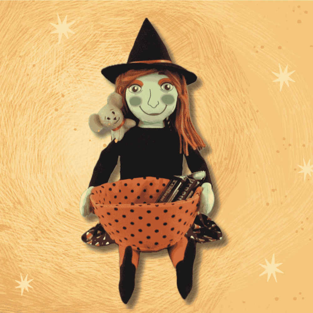 Witch Grannie soft toy on a starry background