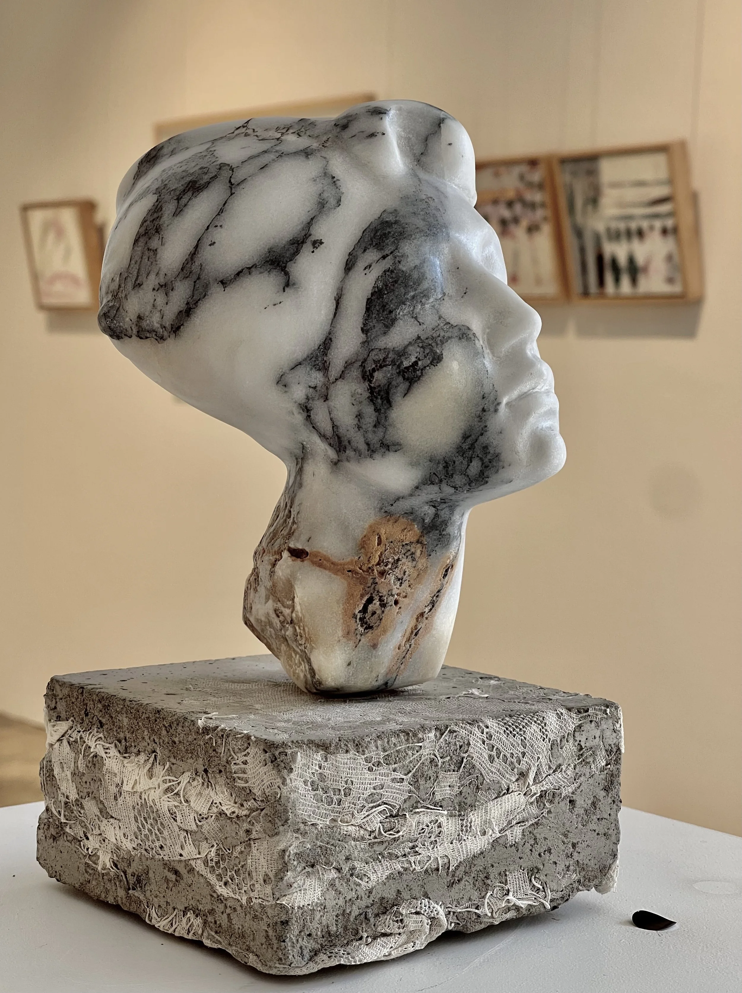 Paonazzo Carrara marble on concrete with vintage lace