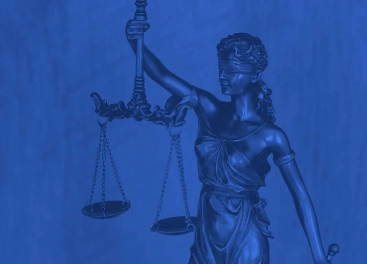 Statue of Lady Justice with a blindfold, holding scales and a sword, depicted in shades of blue.
