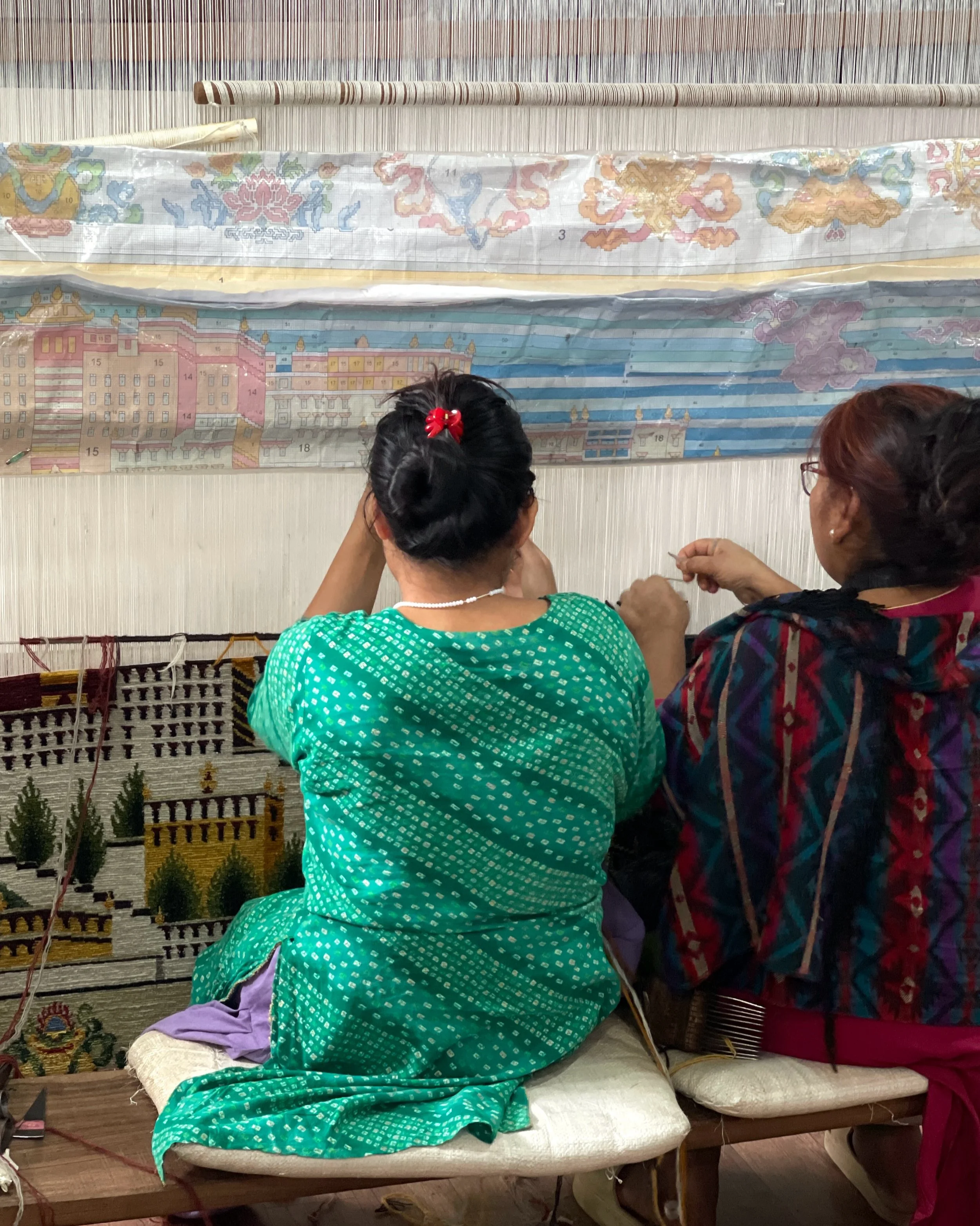 Behind every Potala rug are months of patient, collaborative making. Working side by side, the weavers gradually bring the design to life, hand-tying thousands of individual knots while following intricate colour guides.

At Karnor and Karuna, weavin