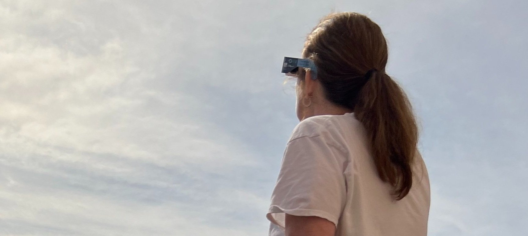 Cropped photo titled "Watching the Eclipse" taken by HIS 104 student Alonica Noble