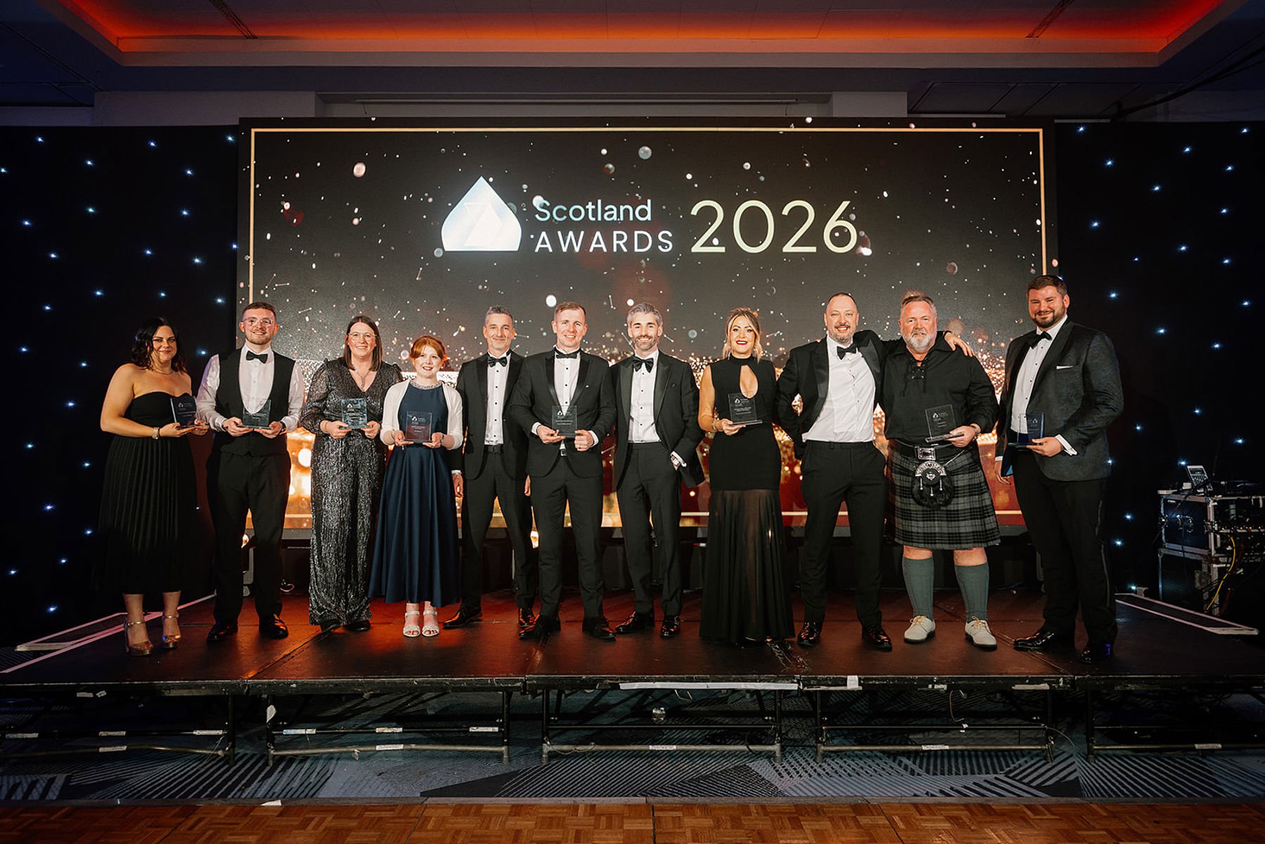 Award winners at The Property Institute Scotland Awards 2026 on stage