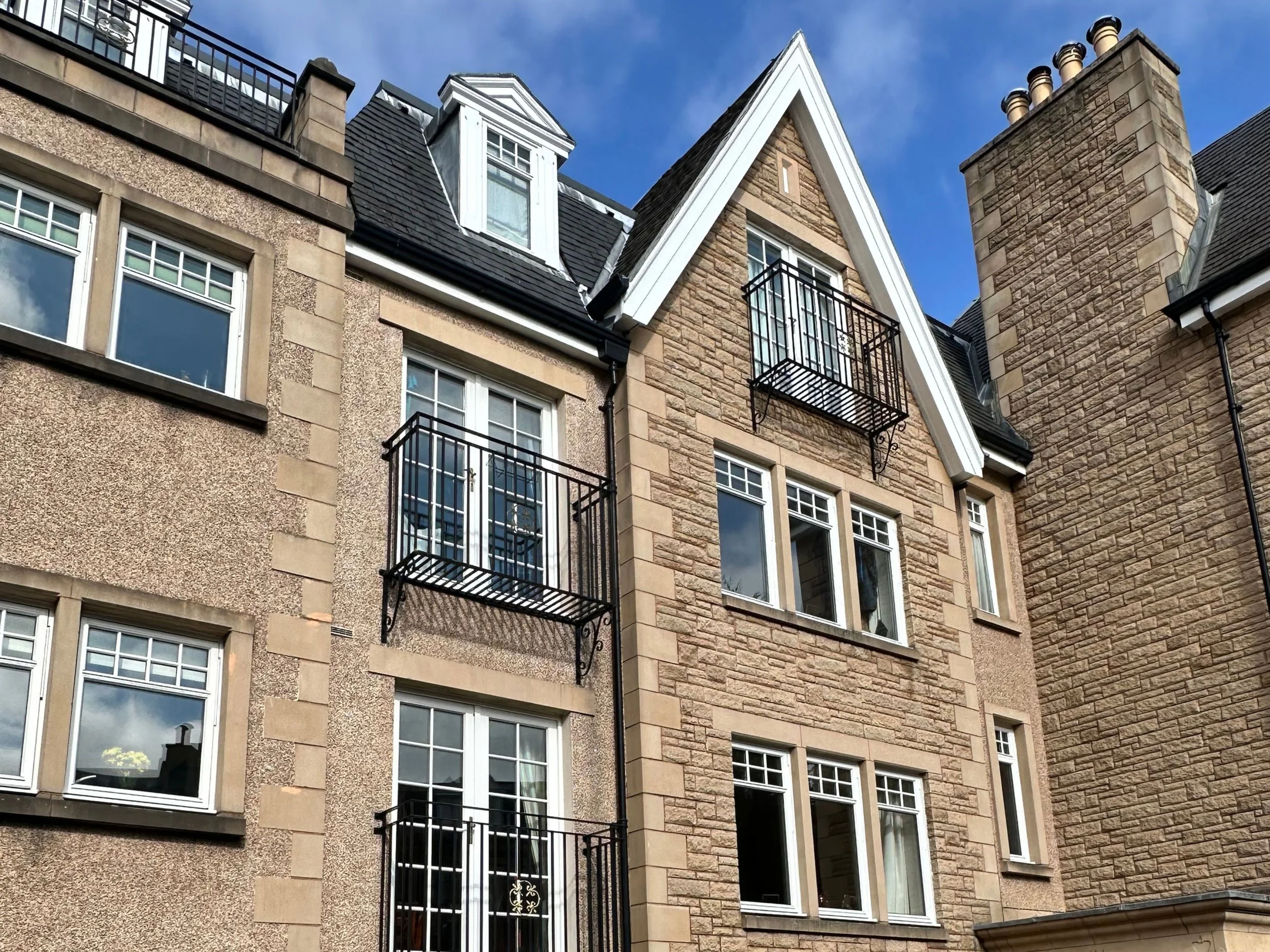 Freshly painted windows at an Edinburgh development.jpg
