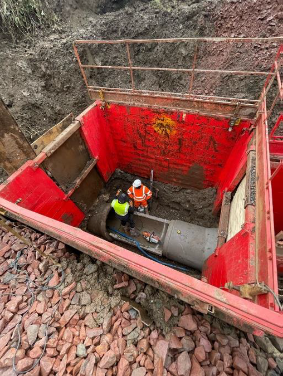 Contractors working on a sink hole in a managed development. in Edinburgh