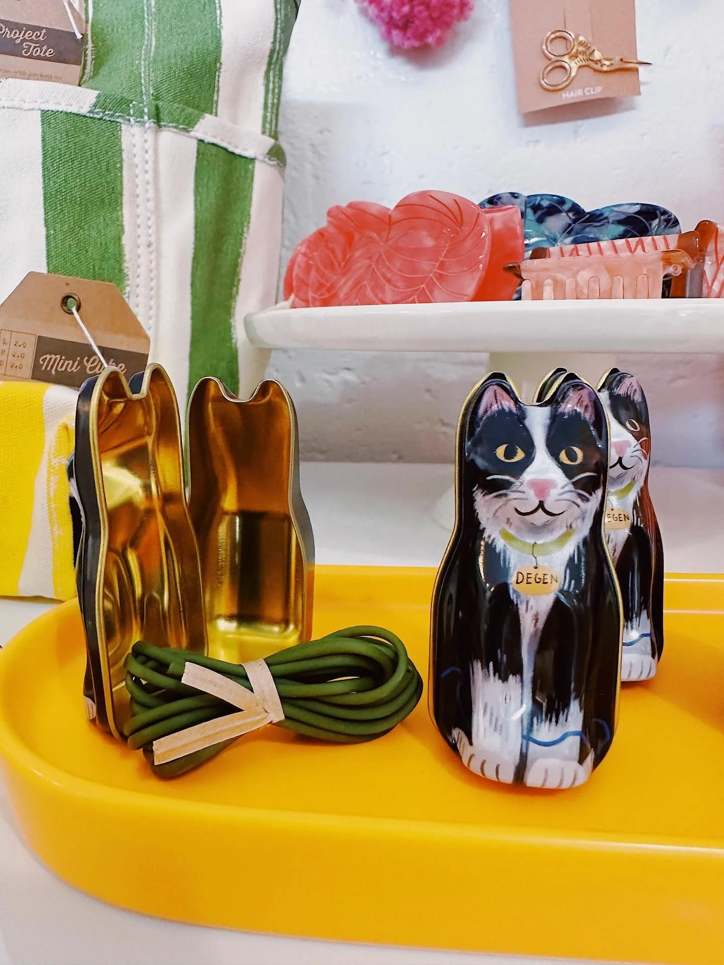 A few of our new obsessions: tuxedo cat tins 🐈, fishy notion bags 🐟, lavender mini scissors ✂️, and candles that smell like &ldquo;she&rsquo;s knitting again.&rdquo; Come see what&rsquo;s new!