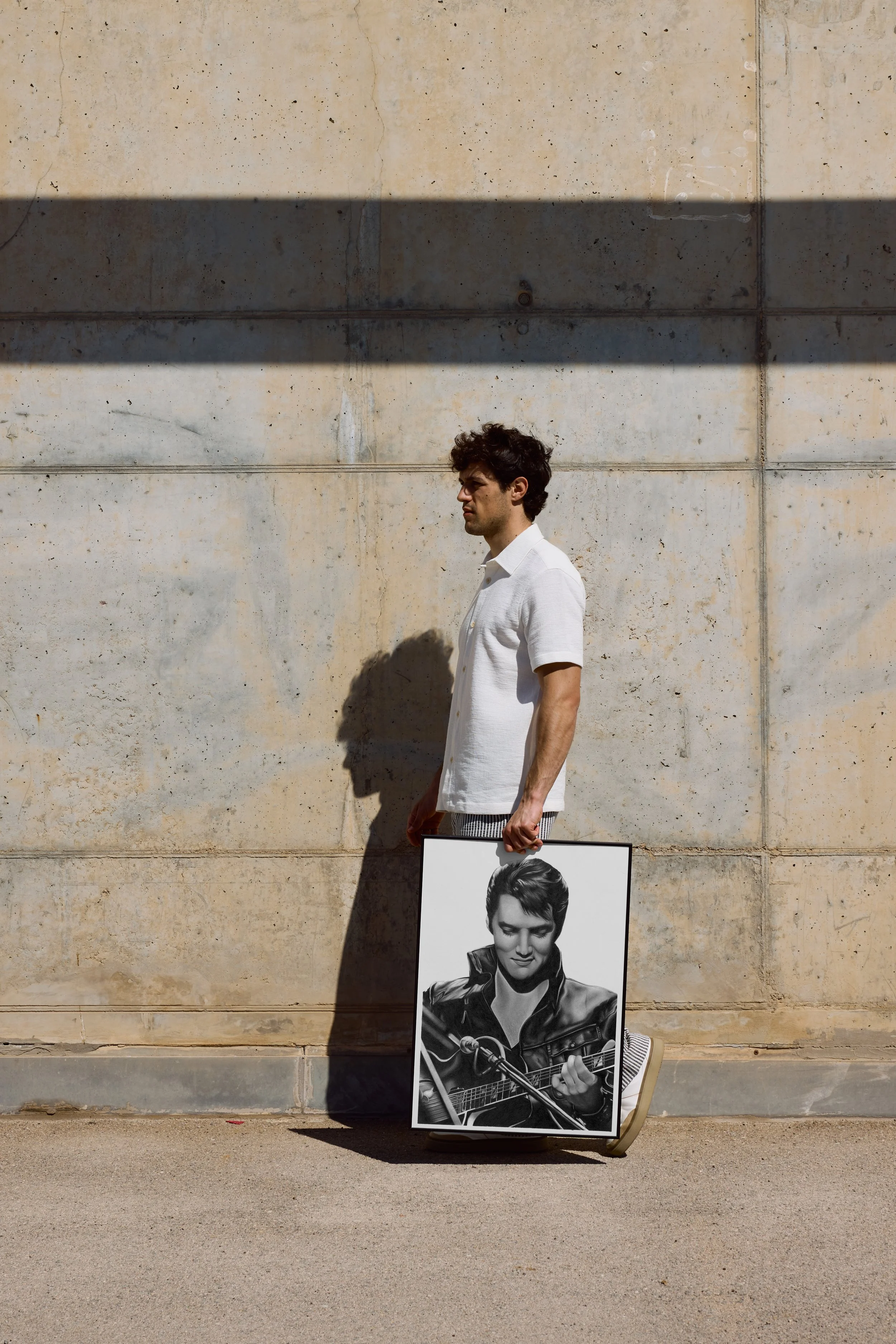 man holding elivs.jpg